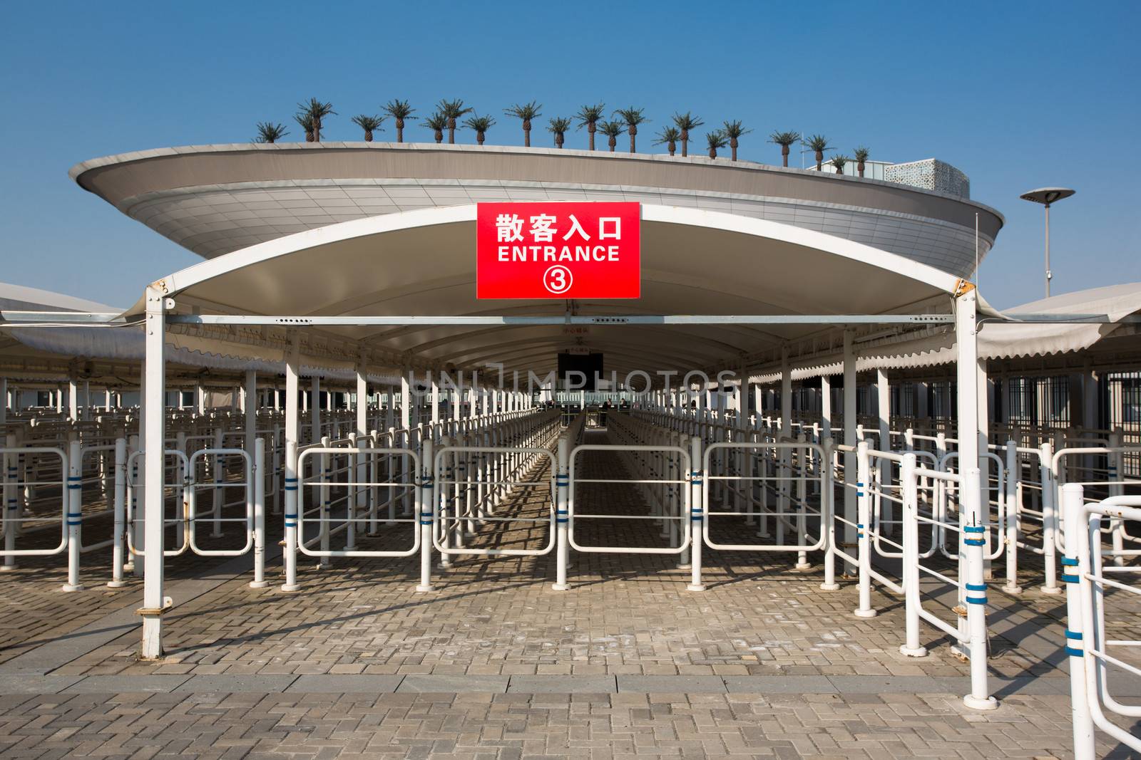 Red sign at the empty entrance of the Saudi Arabia Pavilion Expo 2010 in Shanghai. The pace is quite surreal.