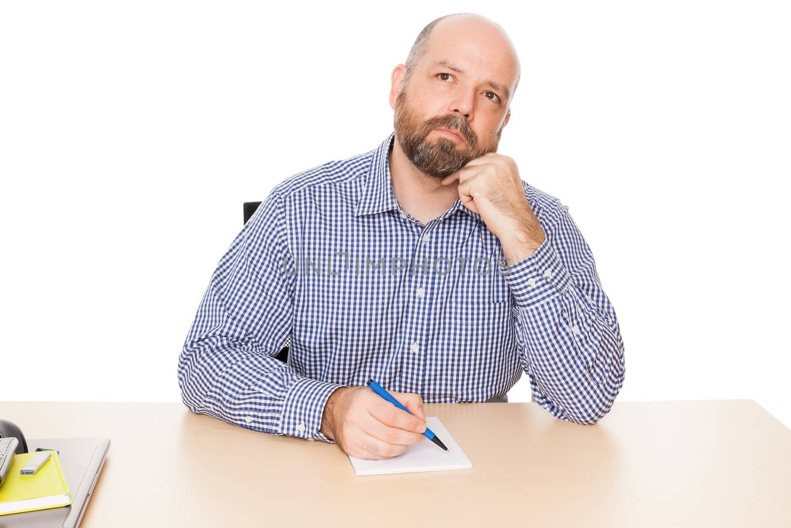 A handsome thinking man with a beard isolated on white background