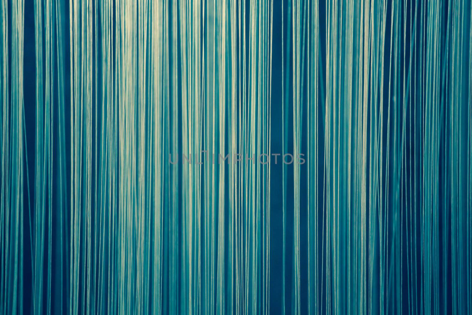 Blue abstract background made of vertical lines