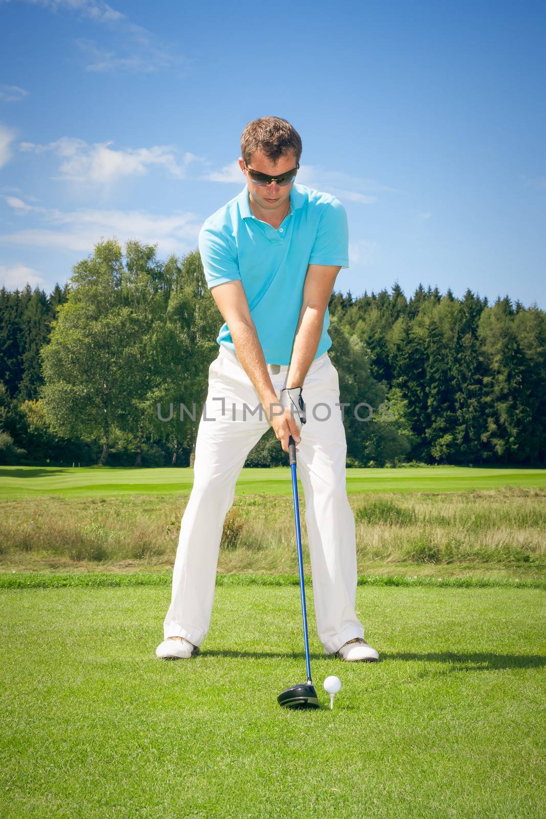 An image of a young male golf player