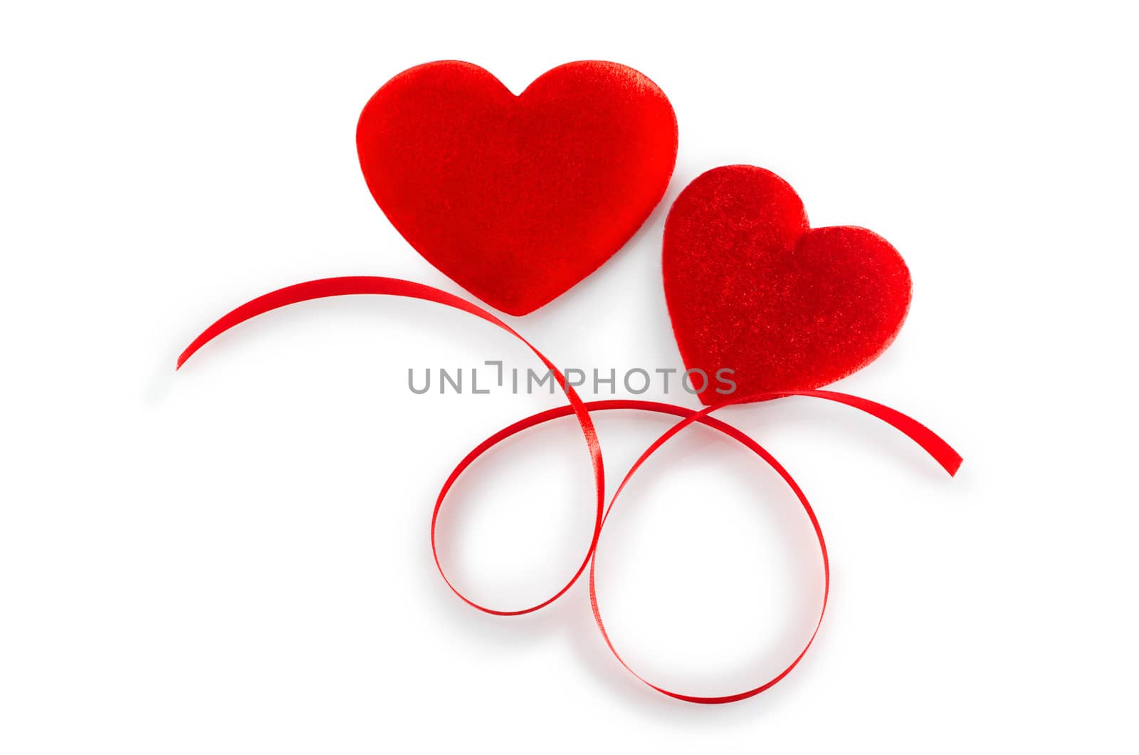 Two Red  Hearts  with red ribbon isolated on white (with path).