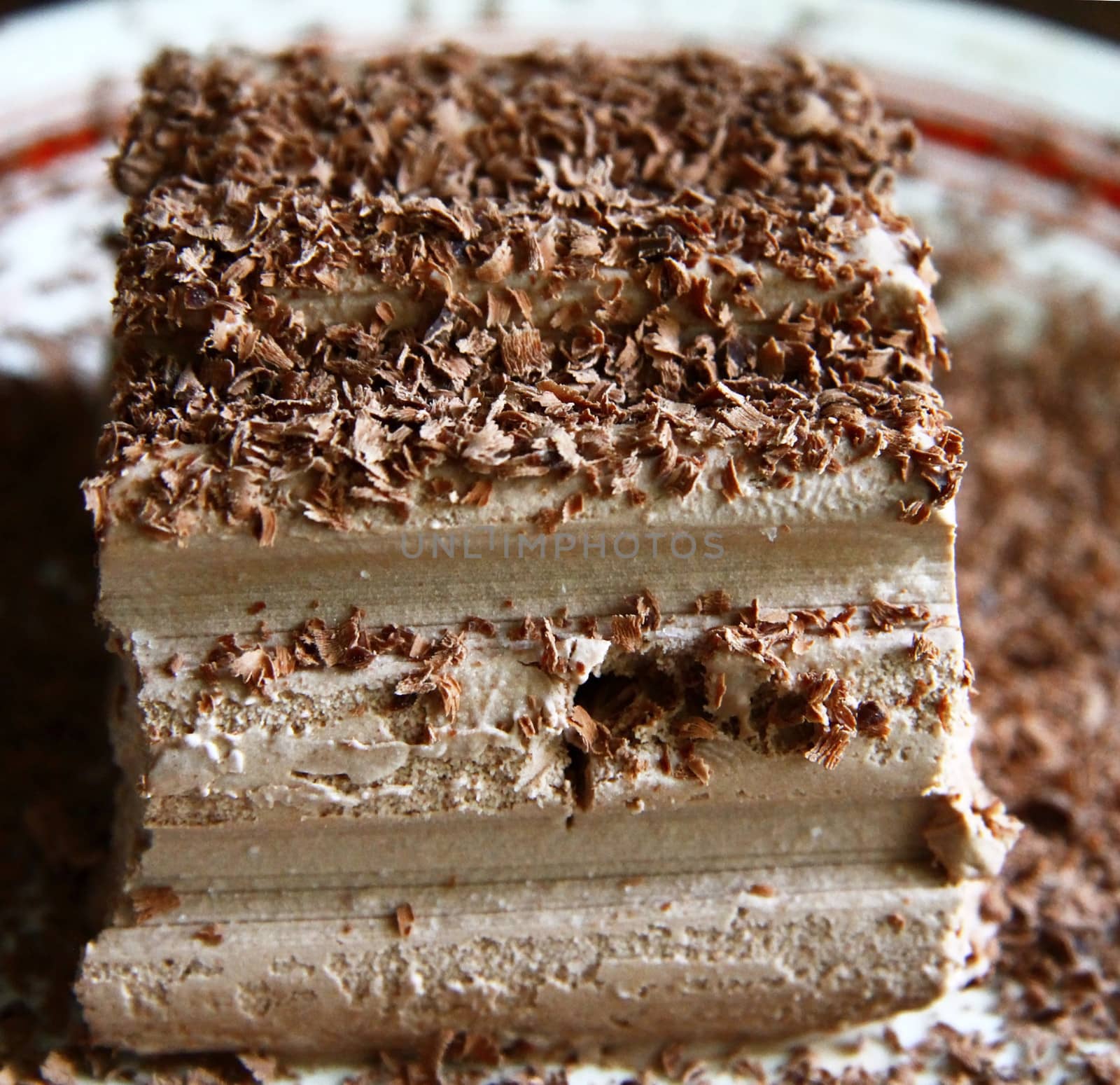 Chocolate ice cream and hardered chocolate over