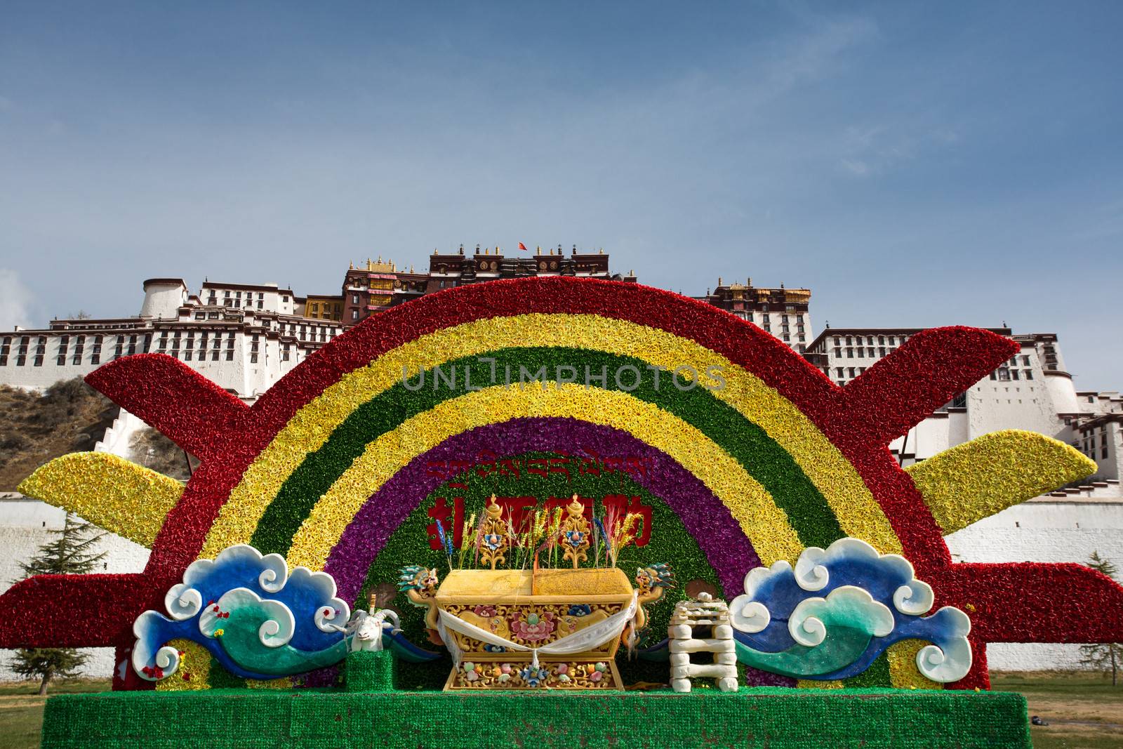 Flower decoration in font of Potala Palace, Tibet. Various photographs of Lhasa in China