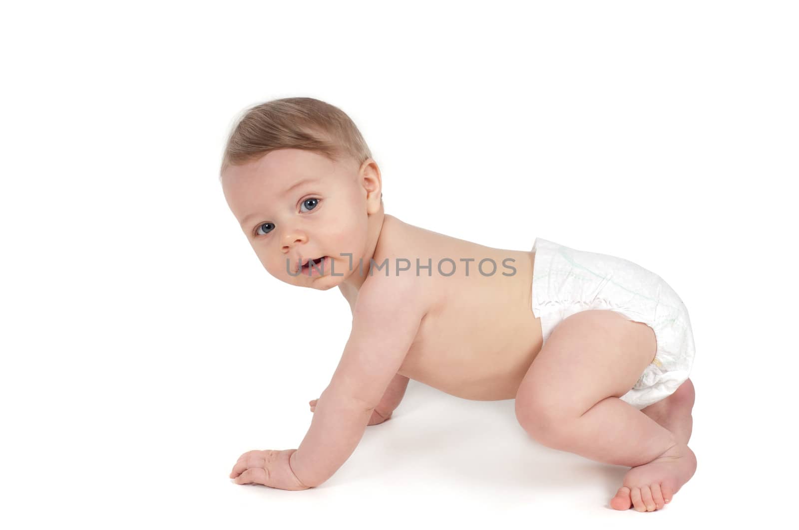 Side view of cute small crawling baby by anytka