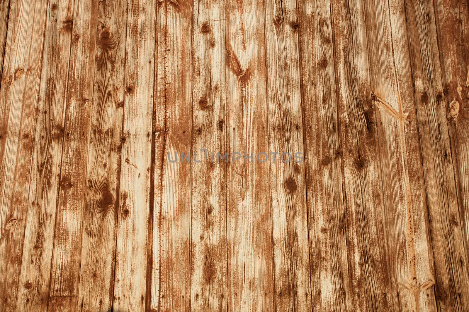 Wood background with yellow light by watchtheworld