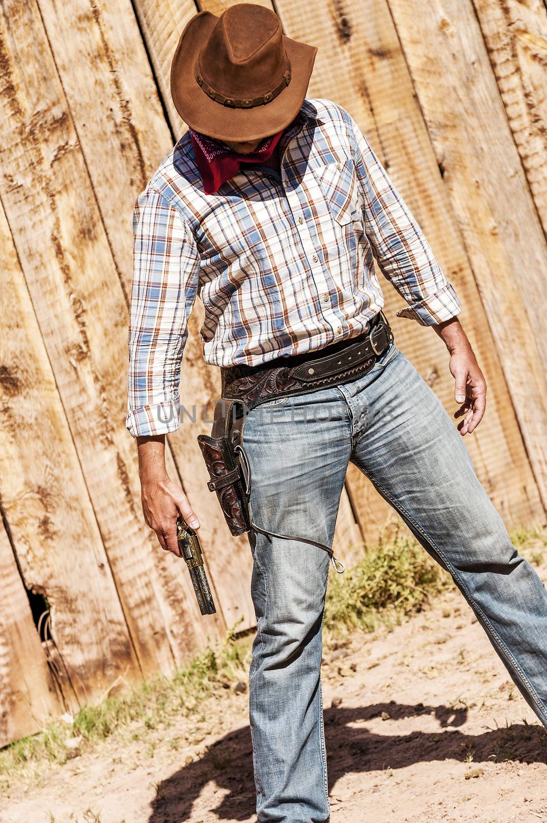 SOUTH WEST - A cowboy takes time to rest and reflect. 