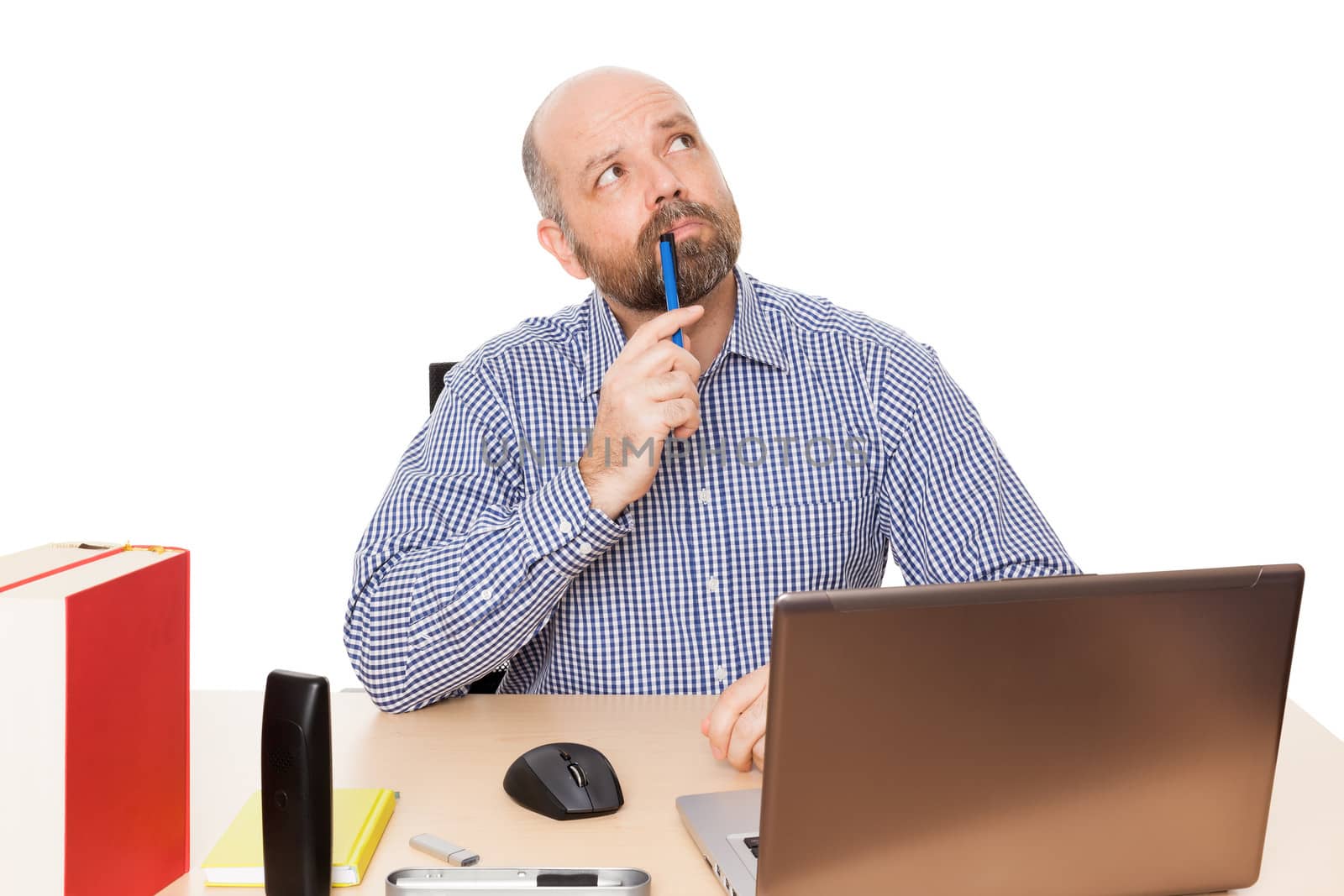 A handsome thinking man with a beard isolated on white background