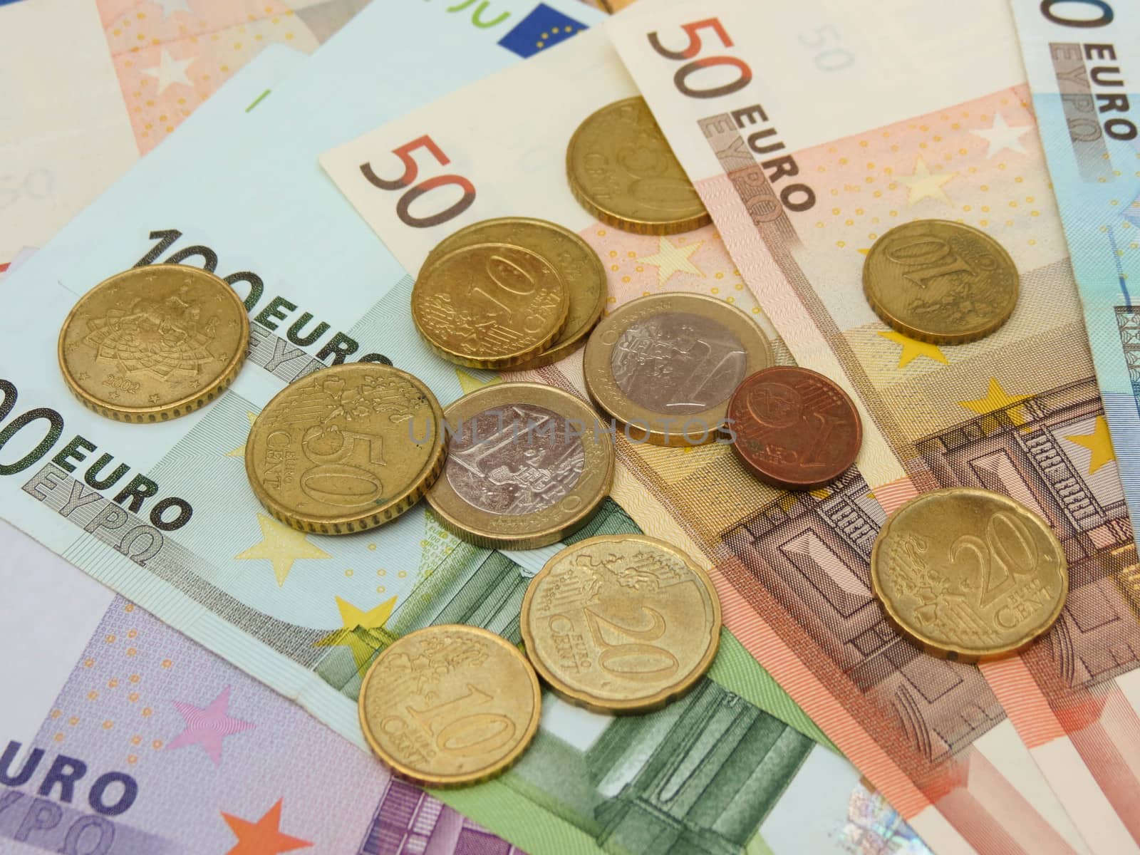 Euro (EUR) banknotes and coins money useful as a background or money concept