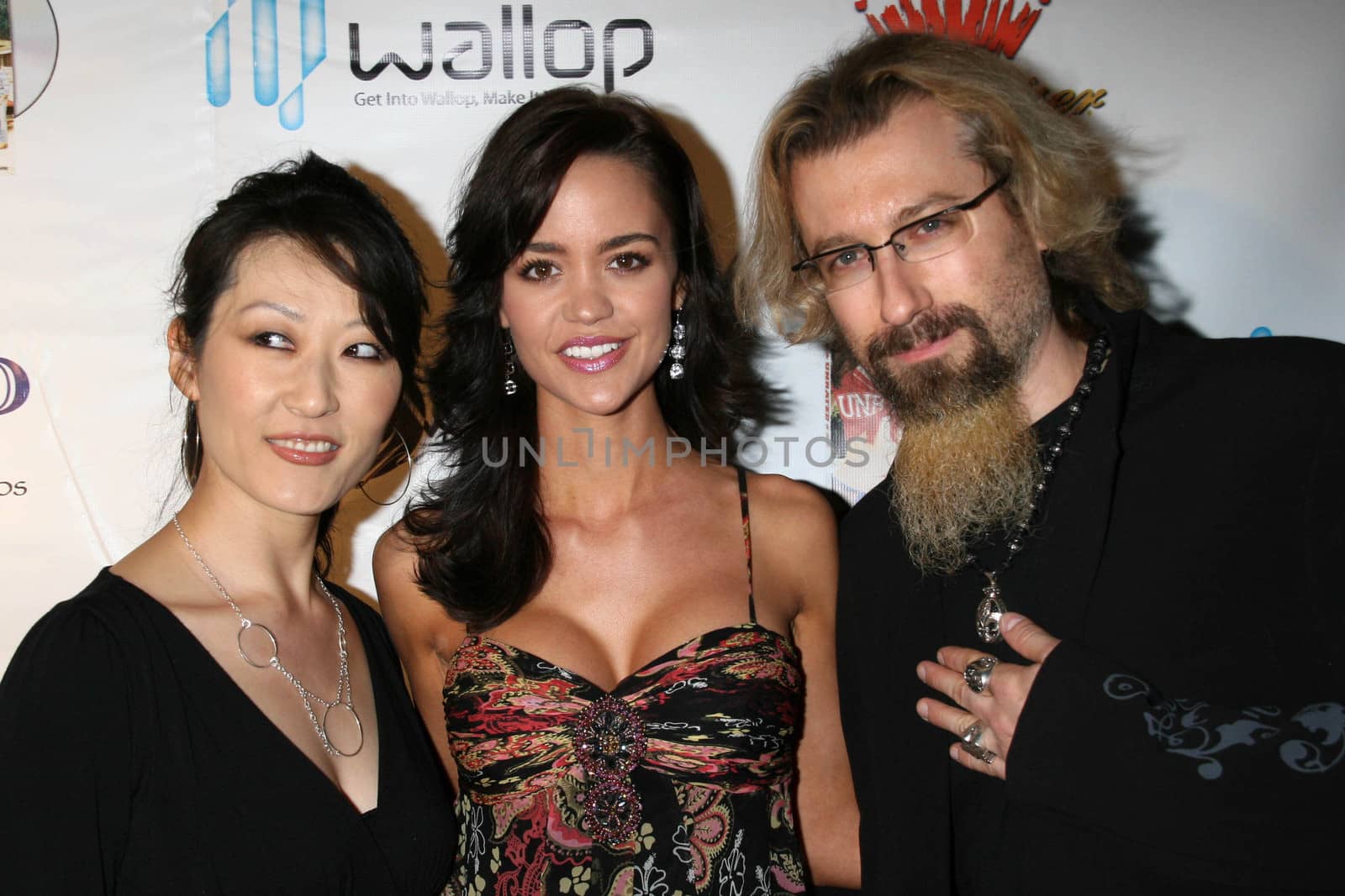 April Scott with the designers of Yoga Army
at the DVD Release Party for "The Dukes of Hazzard: The Beginning". The Forbidden City, Hollywood, CA. 03-21-07