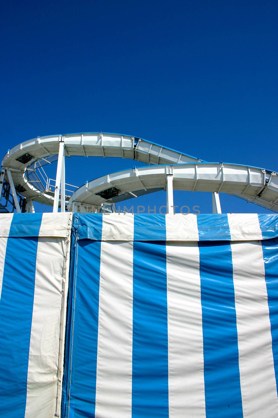 Roller coaster in Brighton under a blue sky