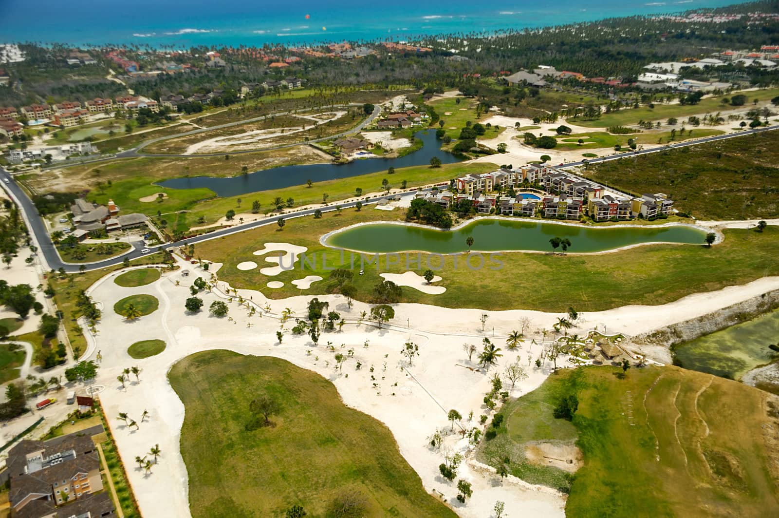 Flying above a golf course at an exotic destination