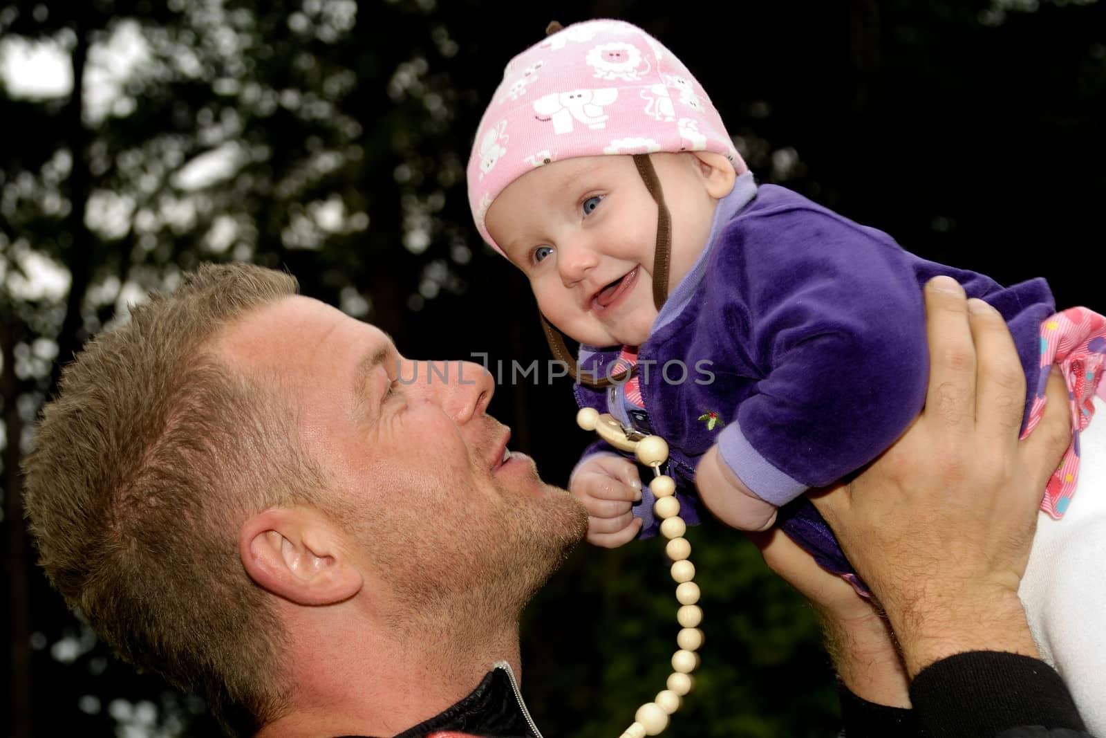 Happy baby and father by cfoto