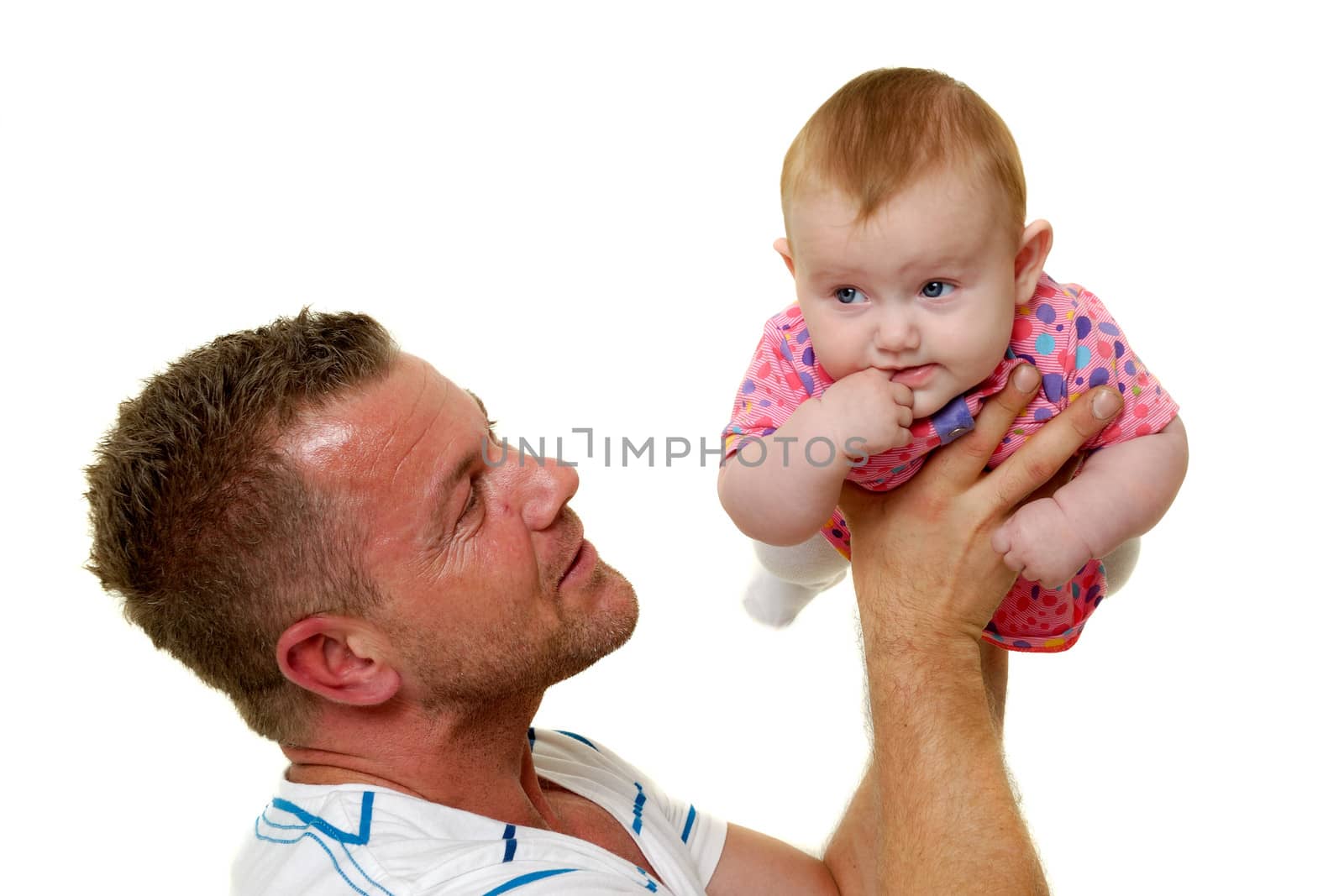 Baby and father are playing. The baby 3 month old. Isolated on a white background.
