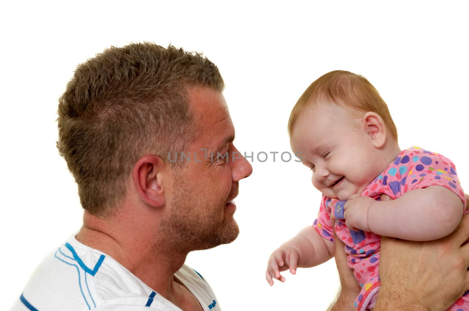 Baby and father are playing. The baby 3 month old. Isolated on a white background.