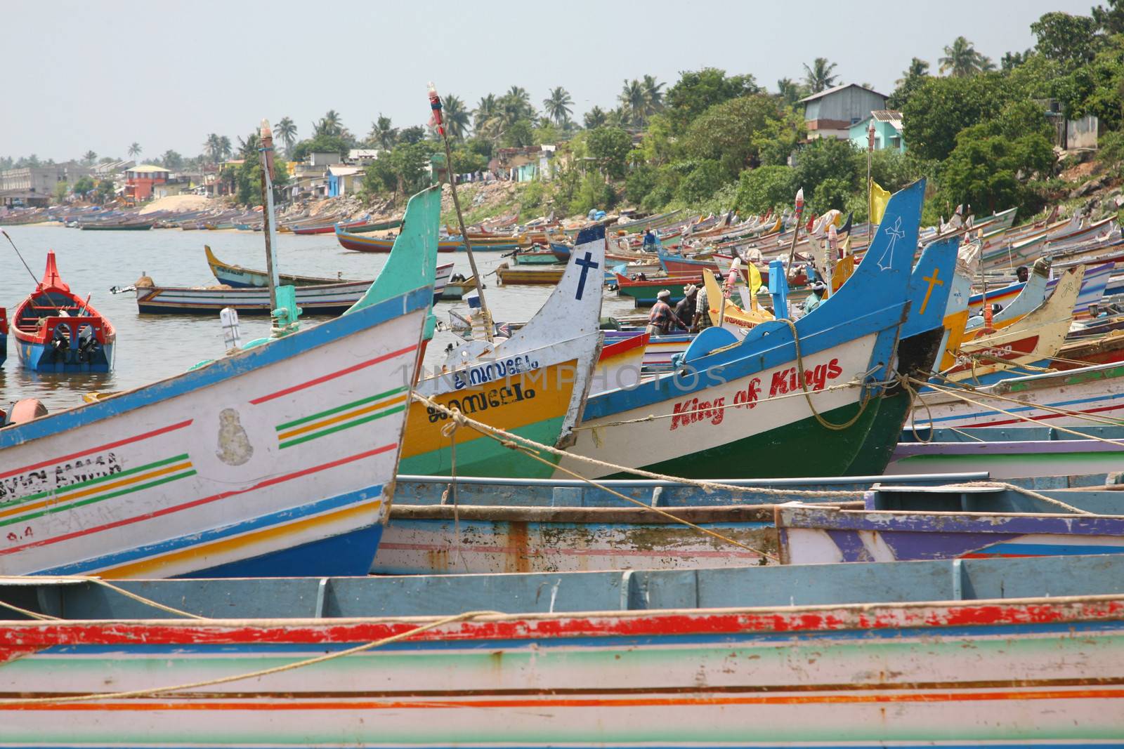 Detail of colored ships on the beach in Kerala State