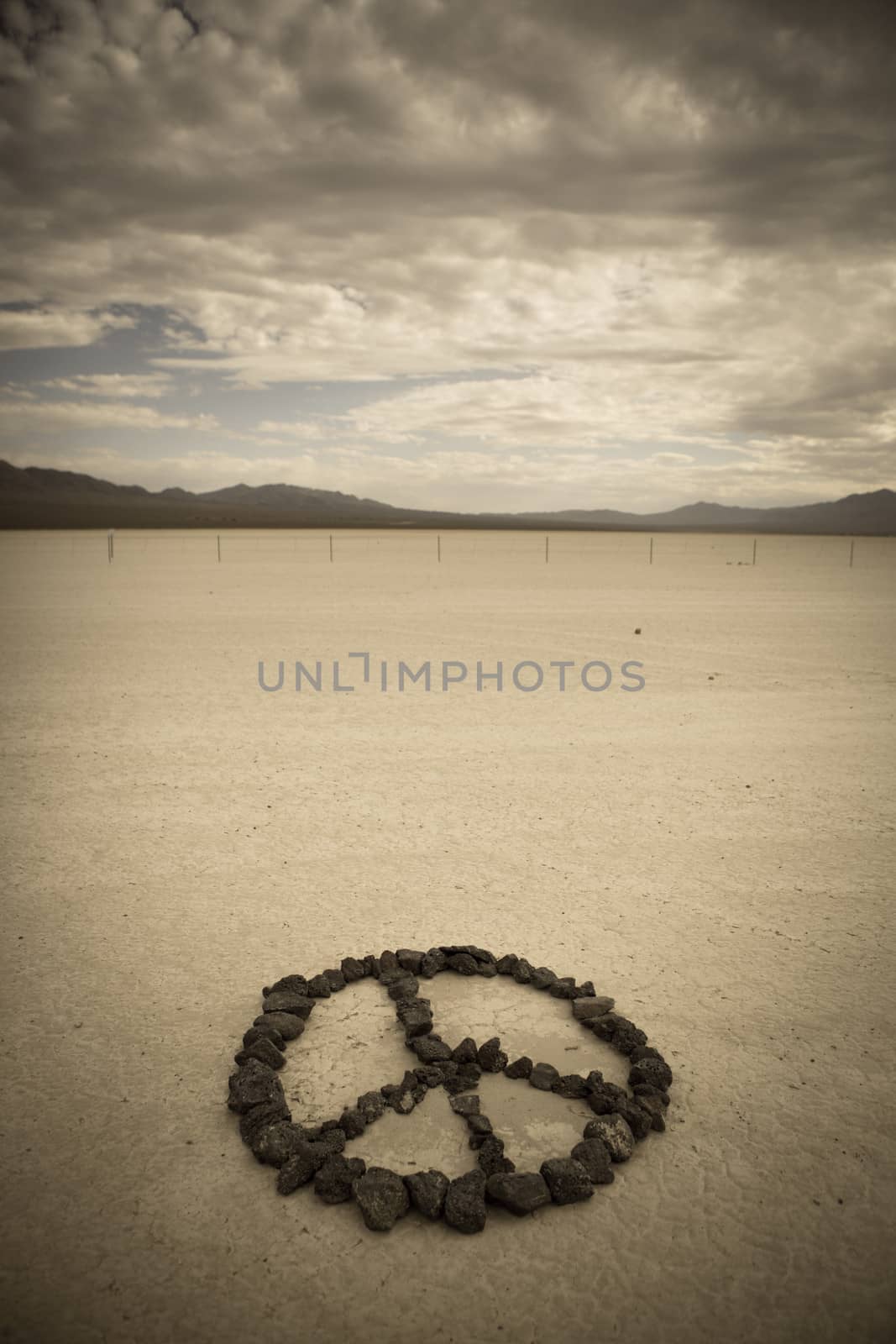Peace shape made with stones in the desert of Nevada - retro style
