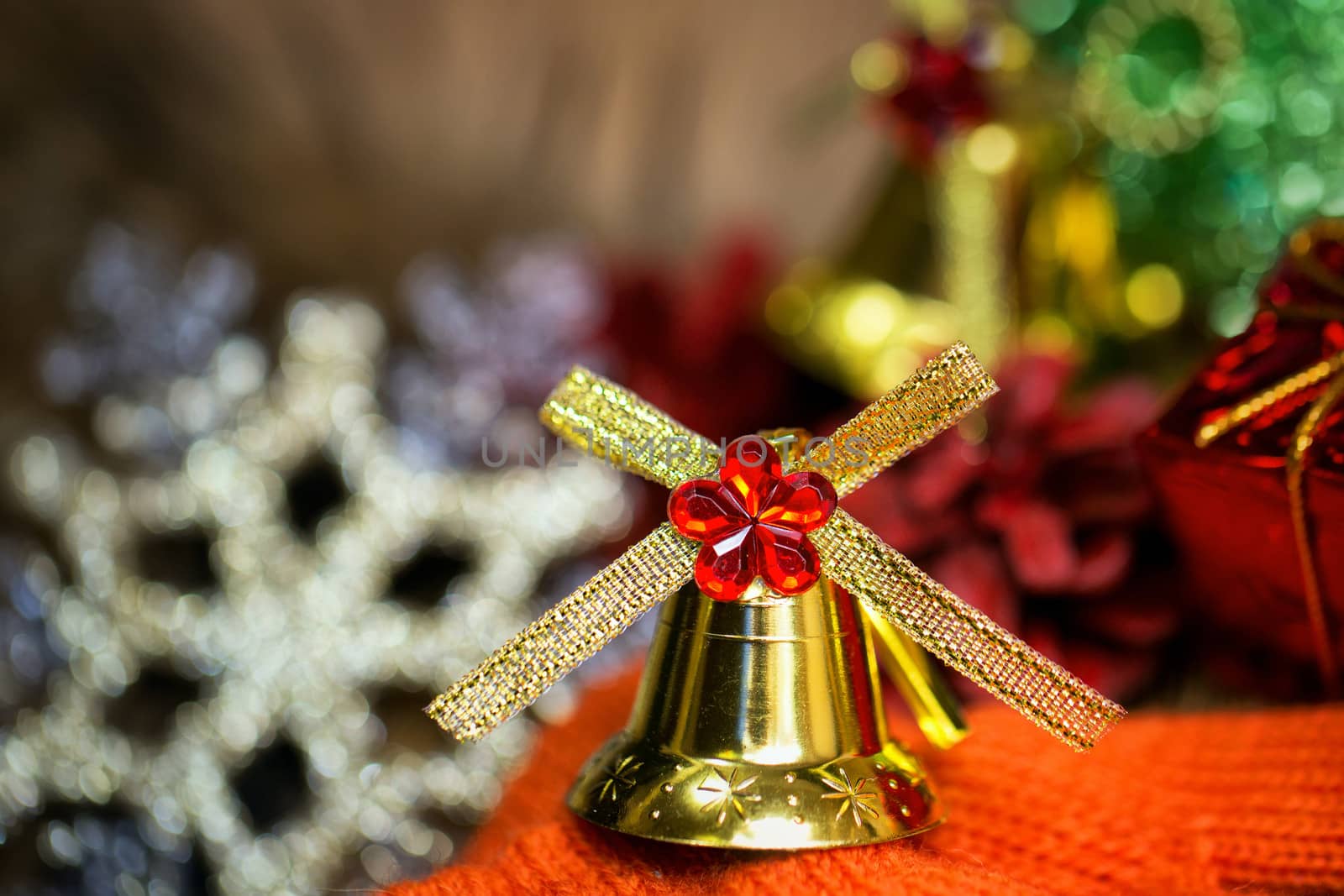 Festive Christmas golden bells photographed close-up background