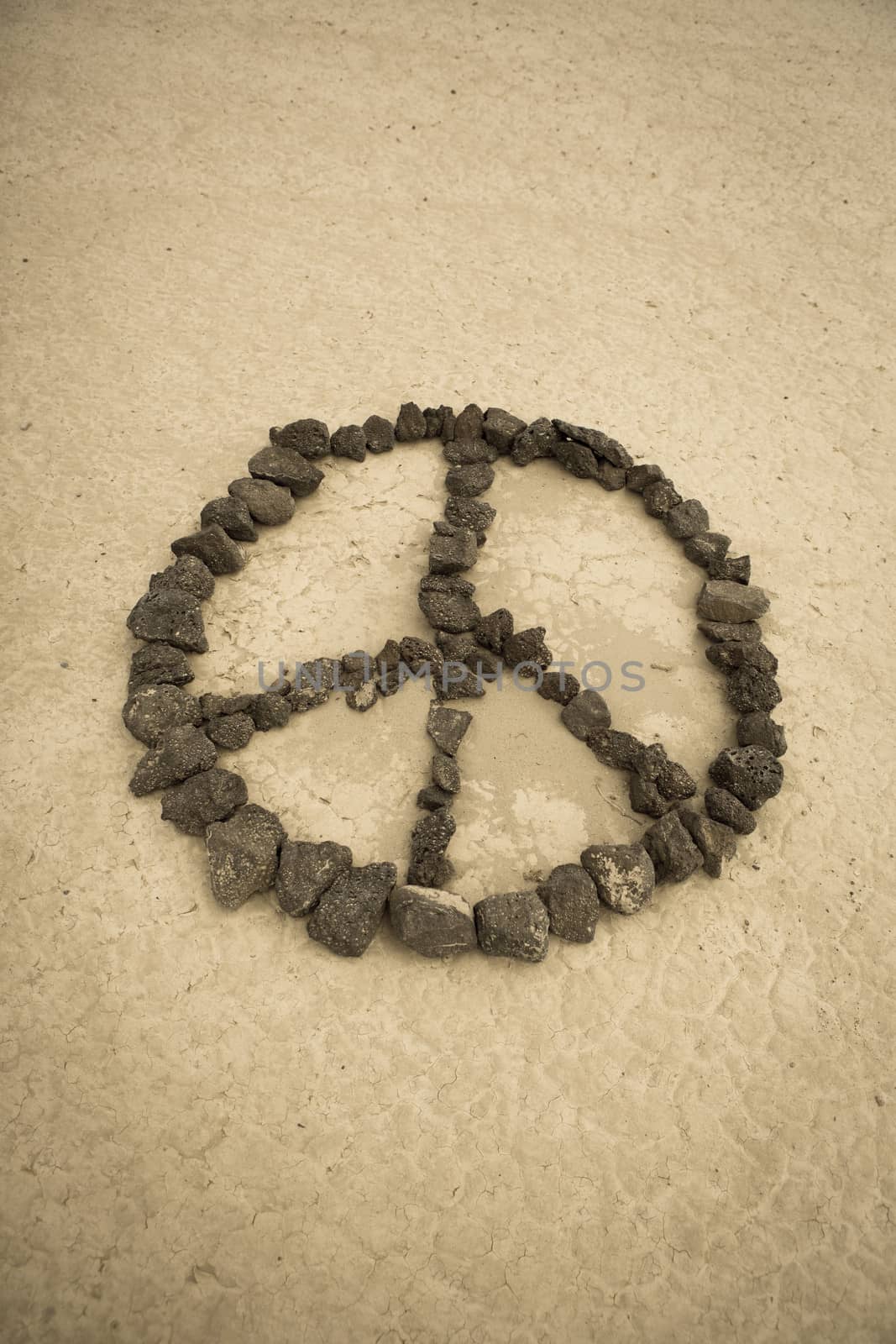 Peace shape made with stones in the desert of Nevada - retro style