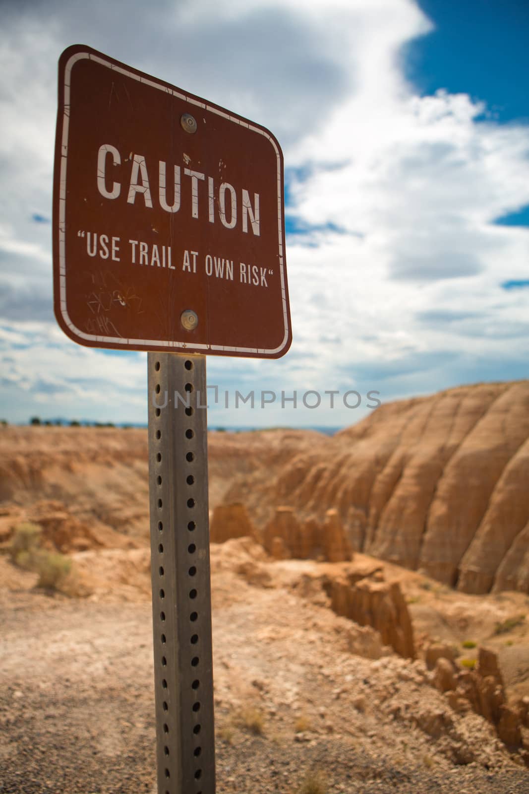 Danger sign with limited access to a footpath at the Cathedral Gorge State Park in Eastern Nevada