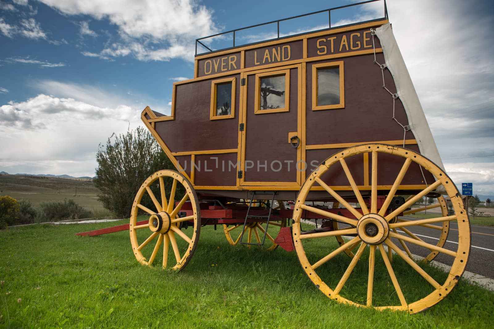 Wild West covered wagon in prairie along the road in Utah