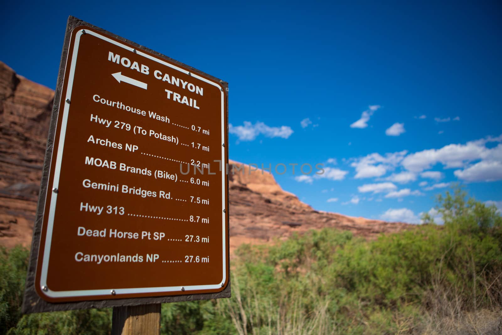 Information sign found at the entrance of Moab city explaining the distances to the different parks, Utah