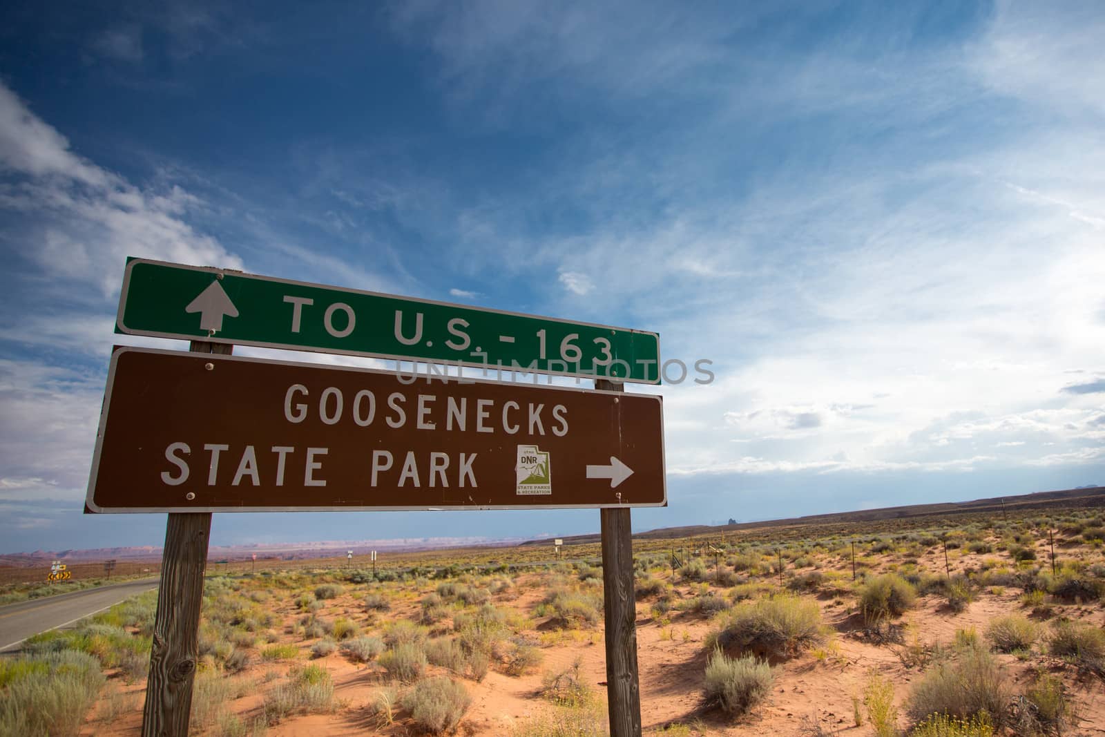 U.S. Route 163 sign road. U.S. Route 163  is a 64-mile U.S. Highway that runs from US 160 northward to US 191 in the U.S. states of Arizona and Utah.