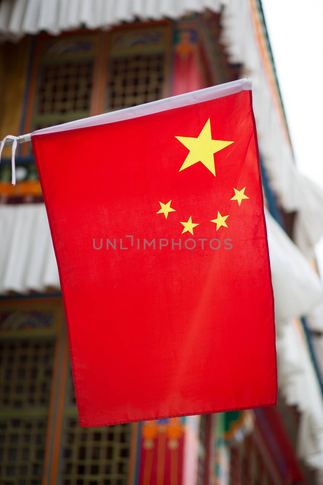 Chinese flag on a traditional Tibetan house in Lhasa, China, 2013