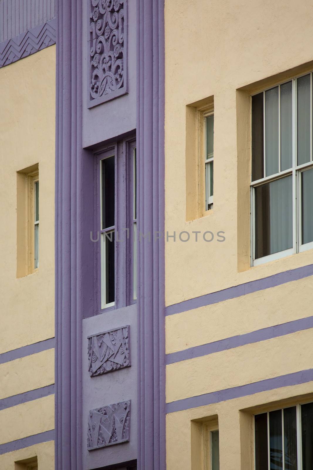 Detail of a classical art deco facade on Ocean drive in Miami Be by watchtheworld