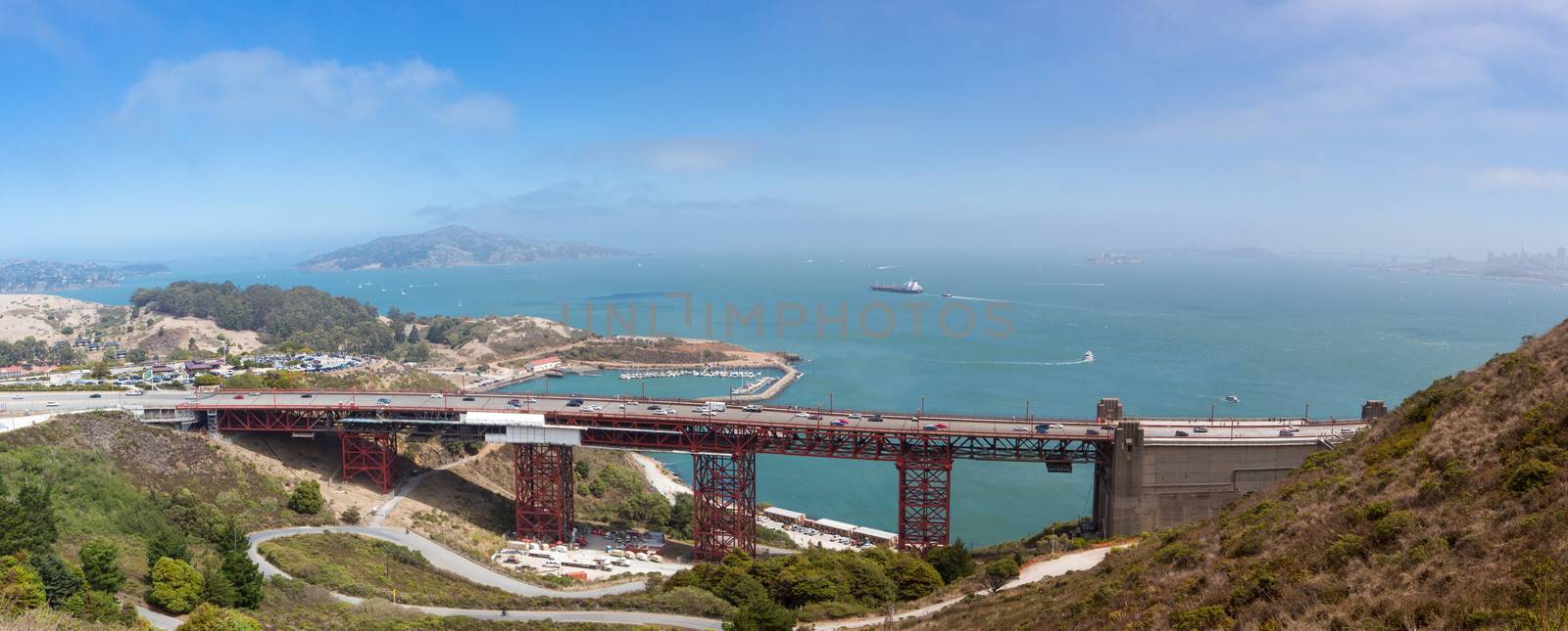 Entrance of the Golden Gate under restoration with the bay and the Pacific Ocean with ships in the background, San Francisco, California, USA.