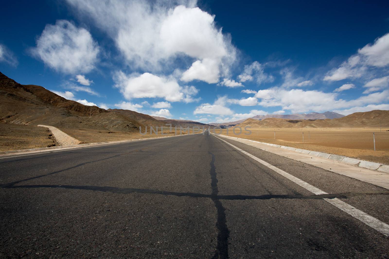 Road of Friendship in Tibet with the view of the mountains and the road, fantastic illusion