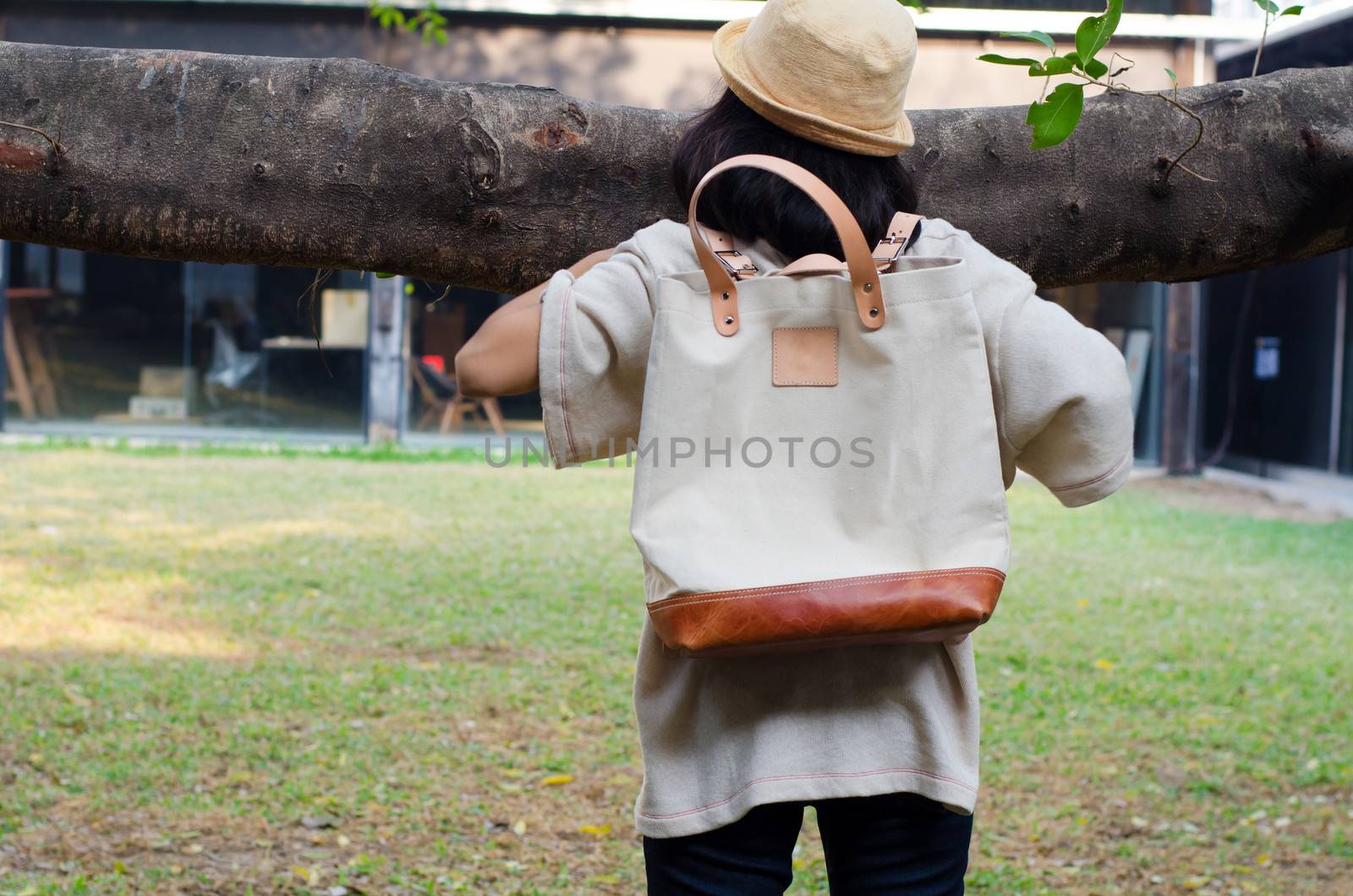 Young woman with a canvas bag by siraanamwong