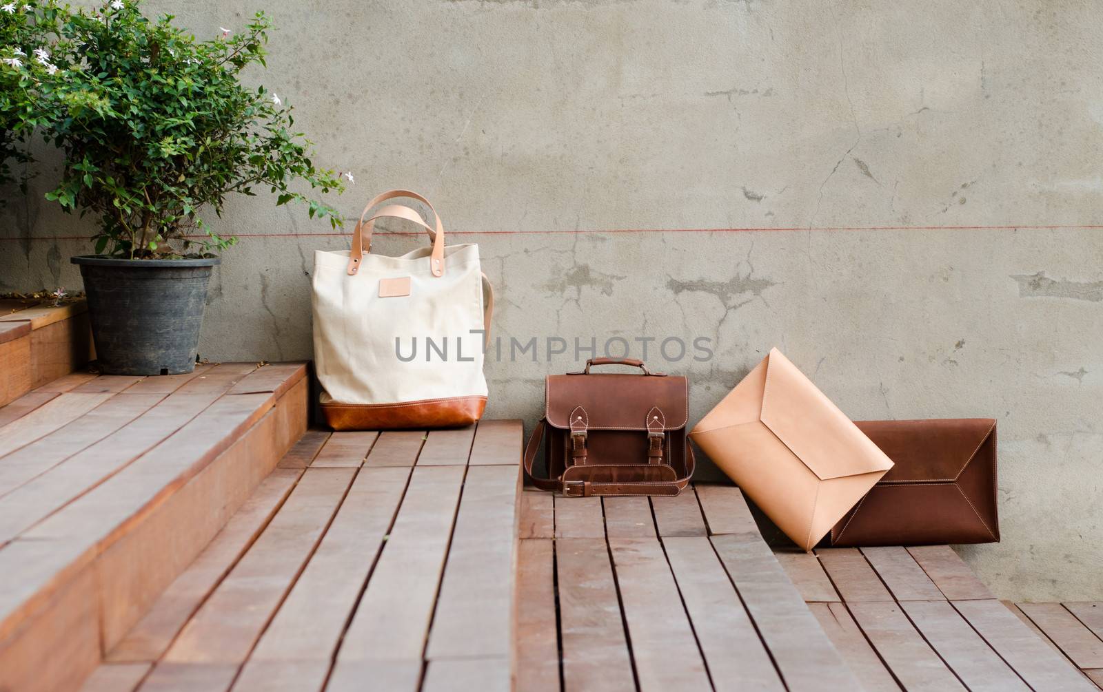 Fashion Leather Bags on grunge background by siraanamwong