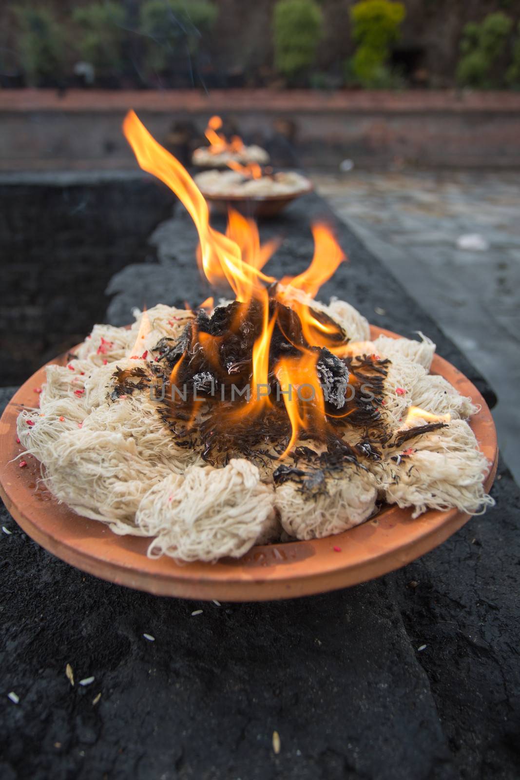 Burning incense sticks outside in Kathmandu, 22 April 2013.