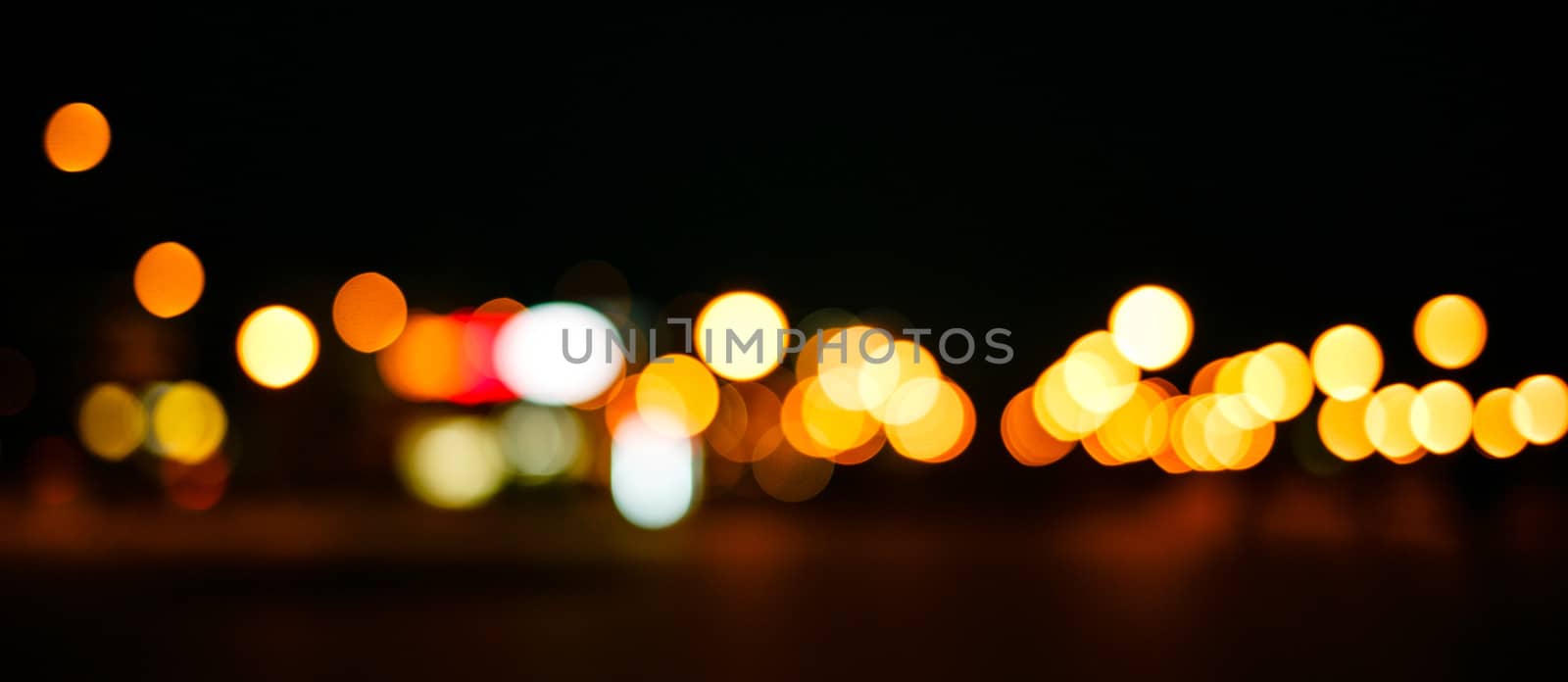 Abstract defocused lights of the night city bokeh background