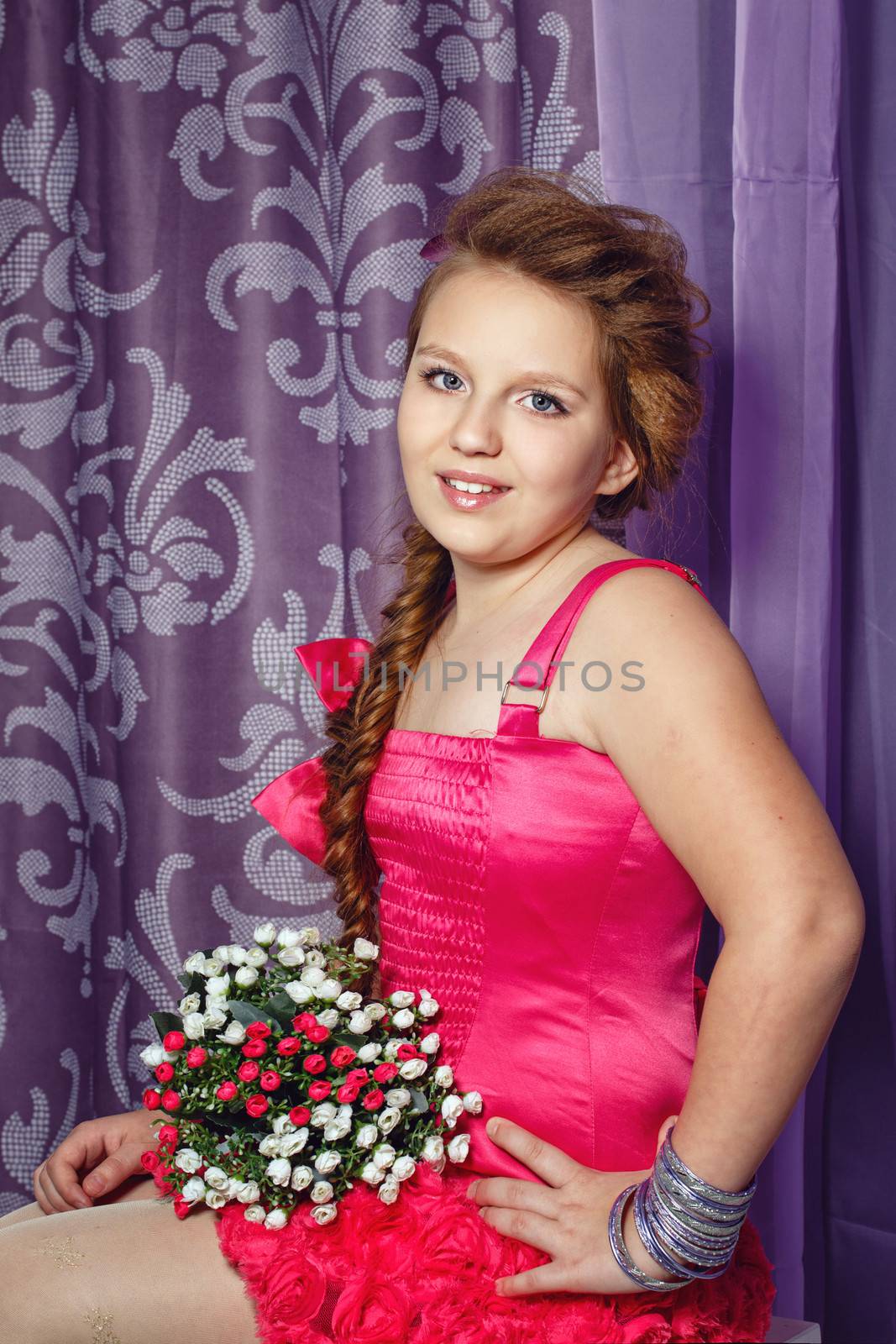 Little girl in pink dress with bouquet of flowers by Vagengeym