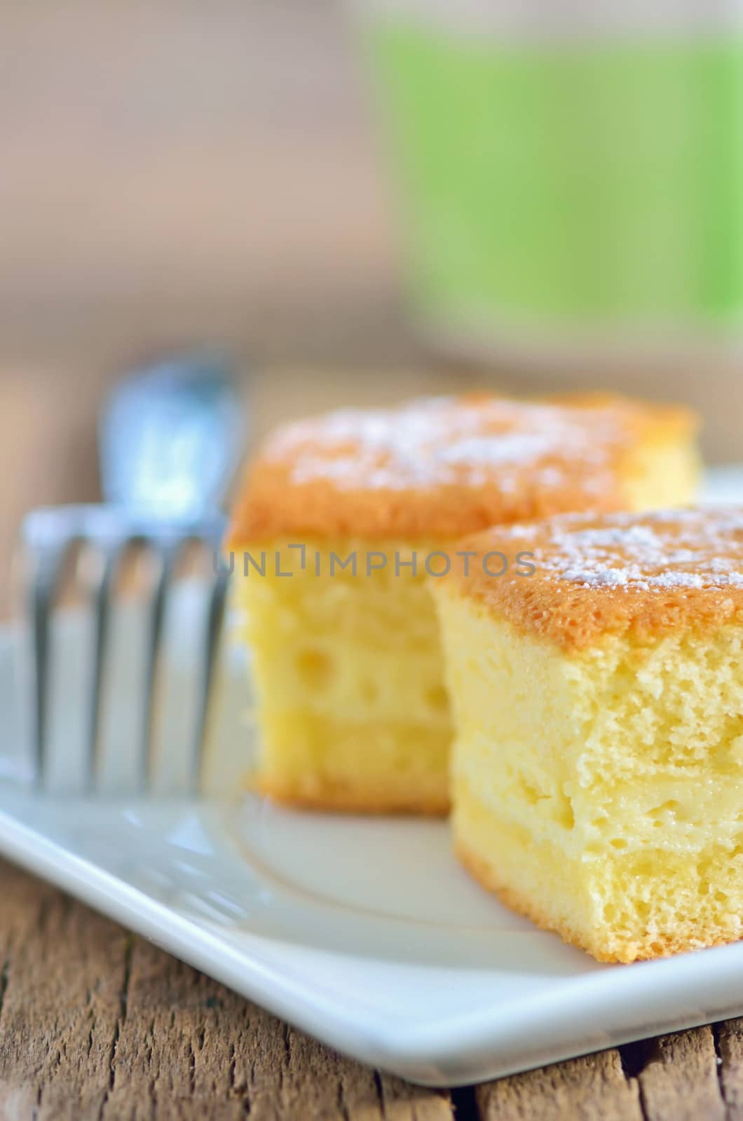 details  slice of cheesecake on plate