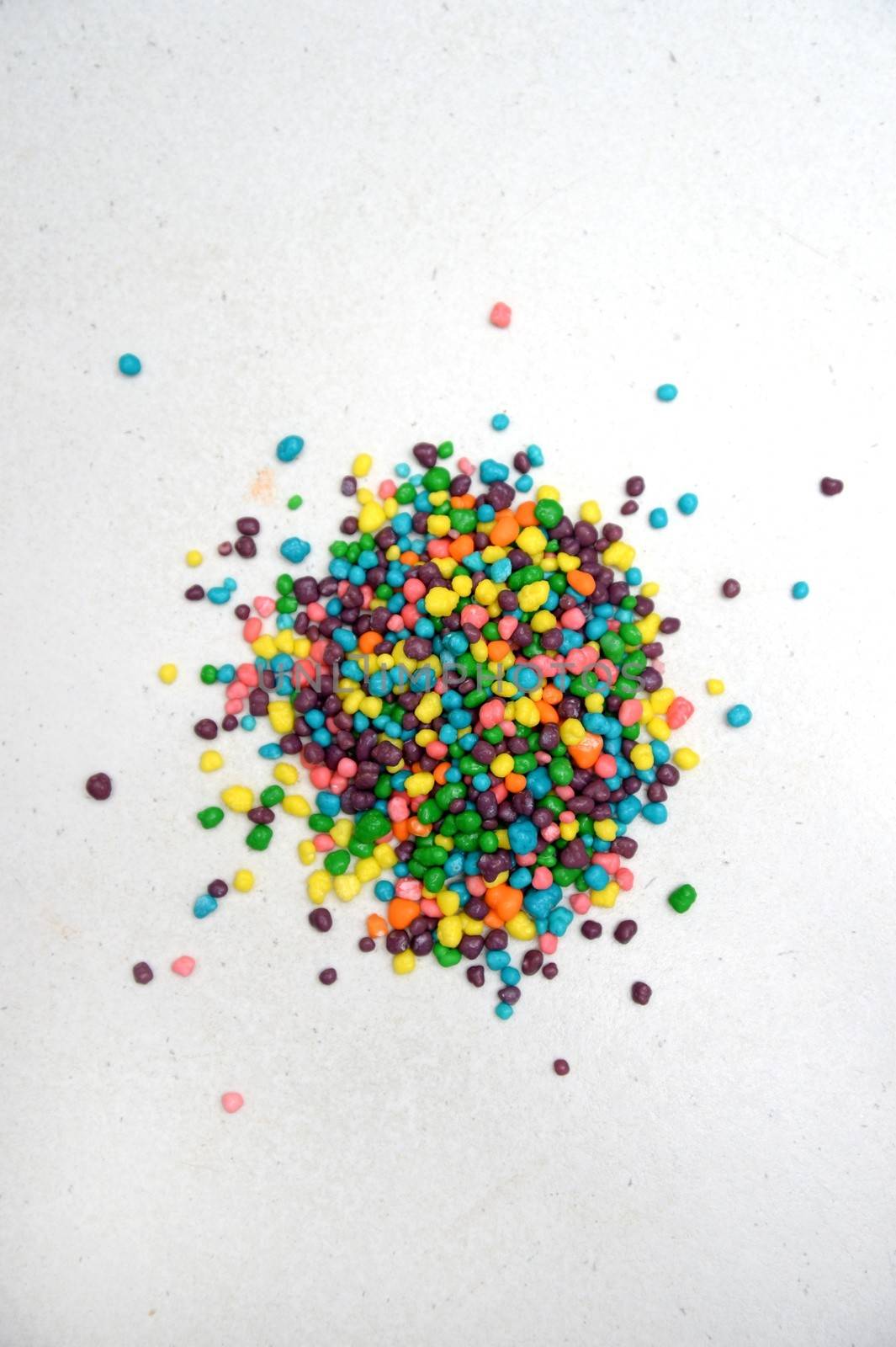 Food decorating sprinkles isolated on a kitchen bench