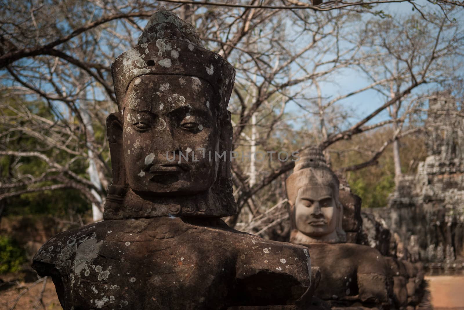 Daemons statues on a bridge at the Angkor entrance