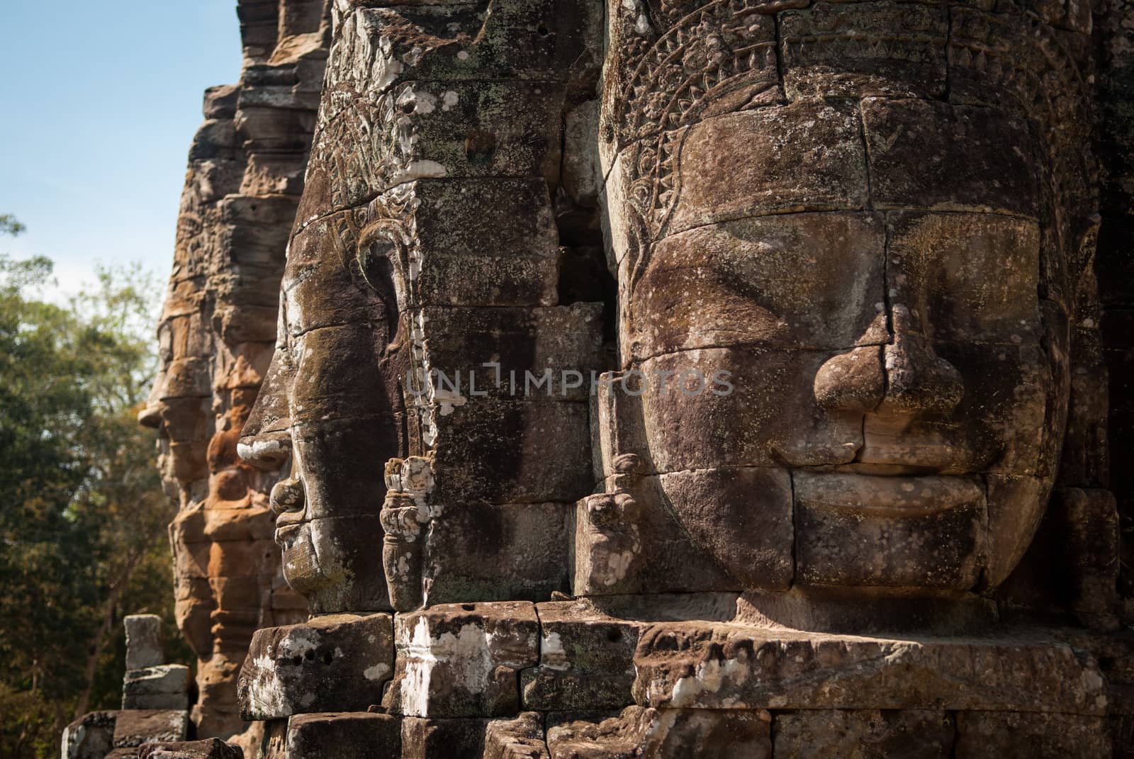 Smiling faces in Bayon Temple, Angkor, Cambodia