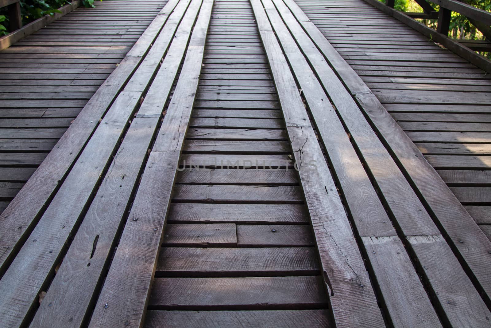 The old wooden bridge across the river