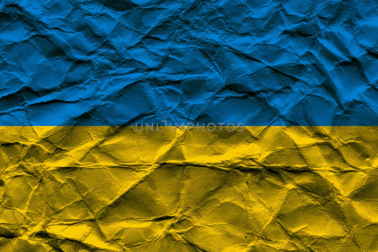 Rumpled National flag of Ukraine with paper texture