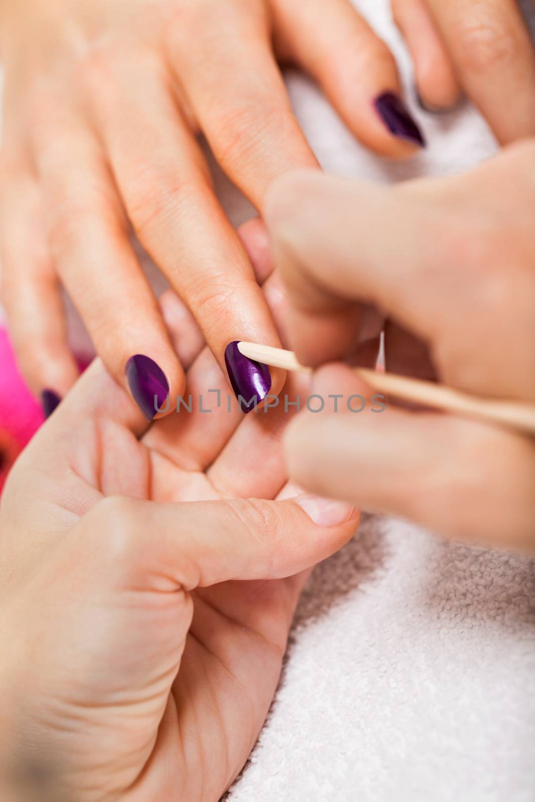 manicure making in beauty spa salon by juniart