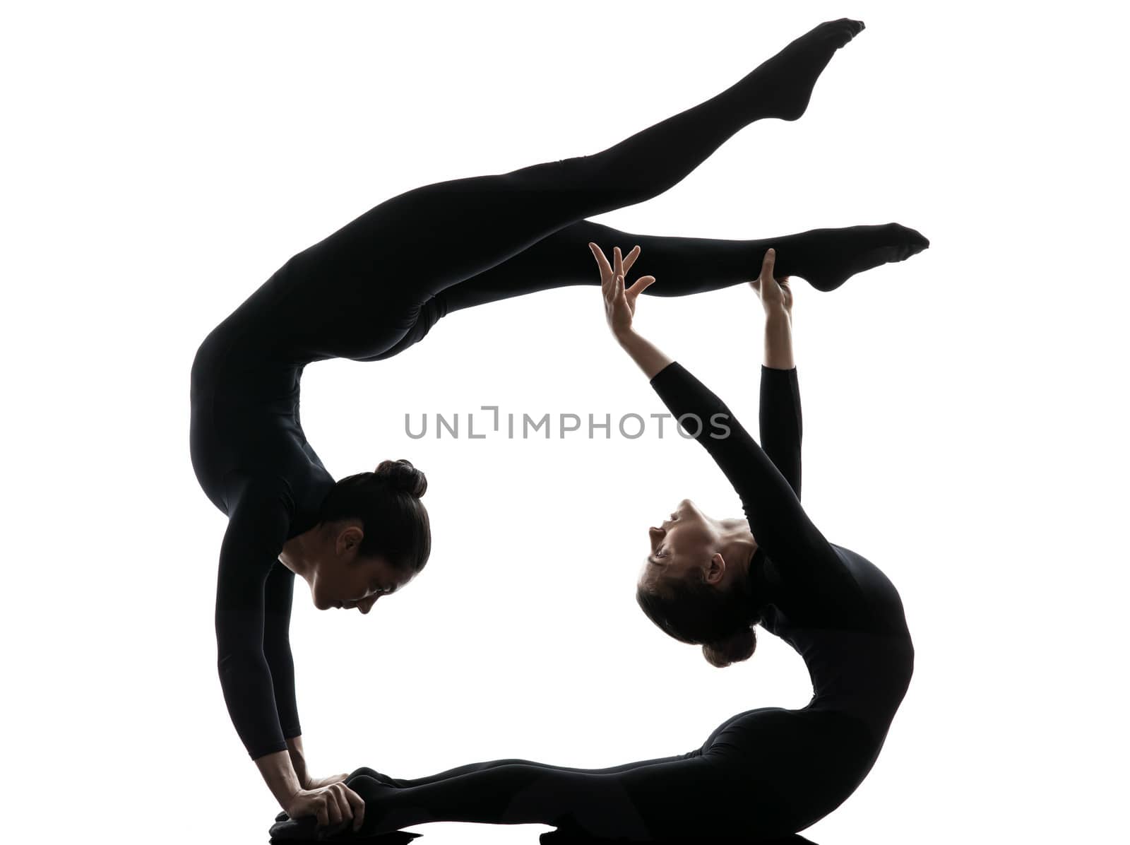 two women contortionist  exercising gymnastic yoga silhouette by PIXSTILL
