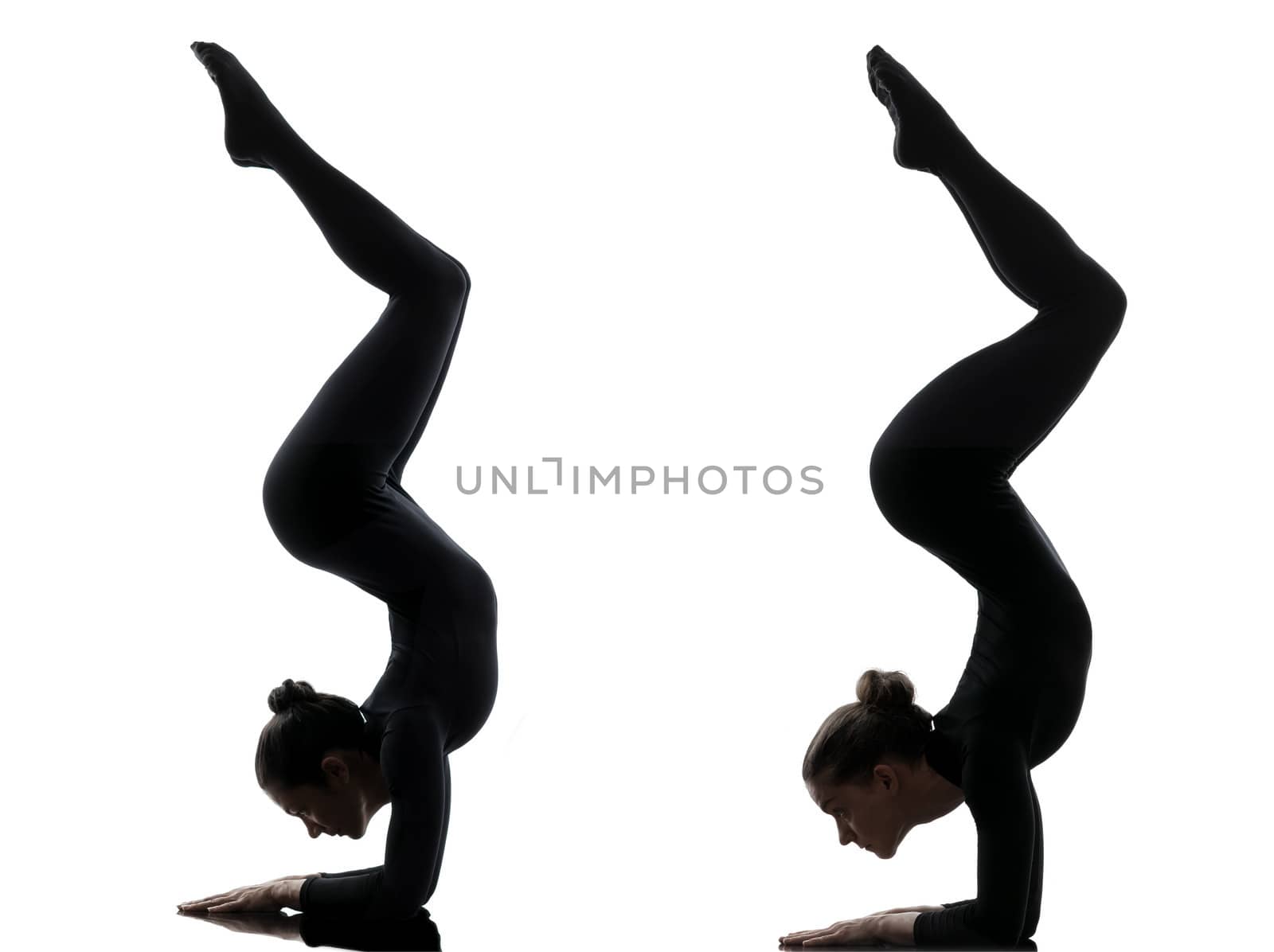 two women contortionist practicing gymnastic yoga in silhouette  on white background