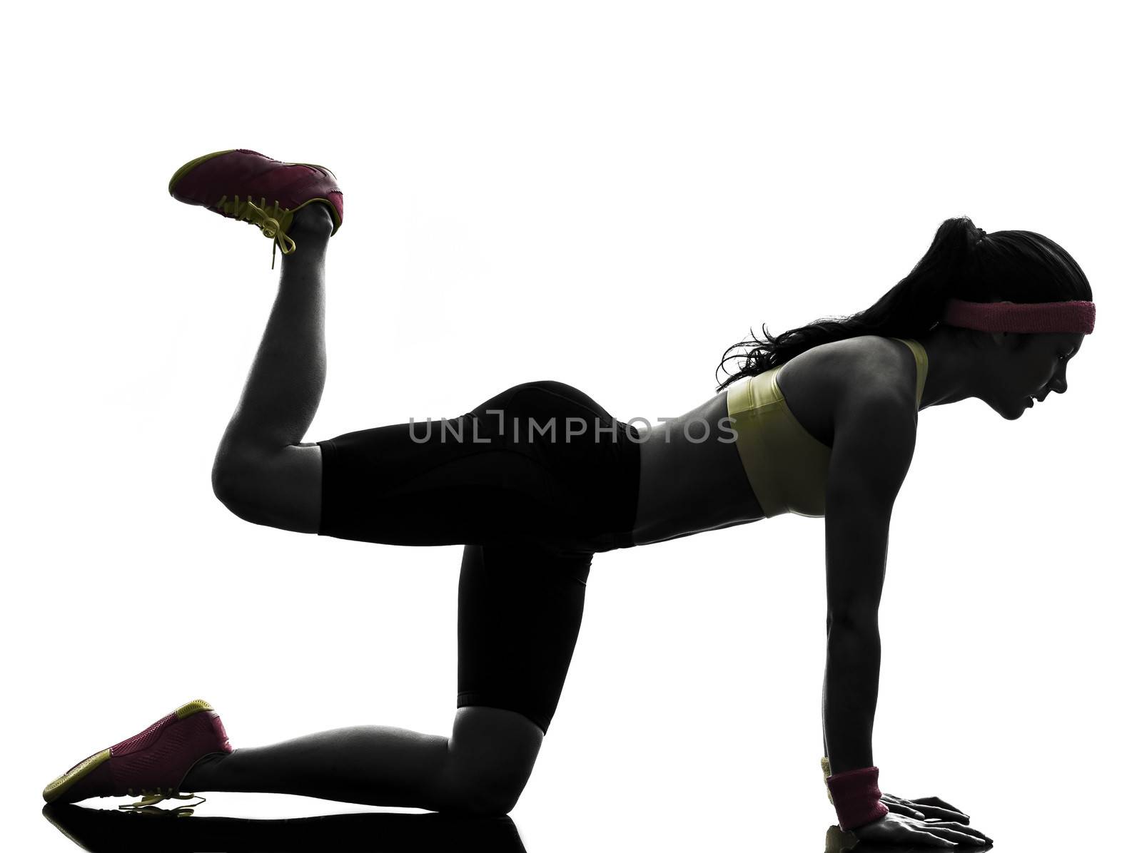 one woman exercising fitness workout in silhouette on white background