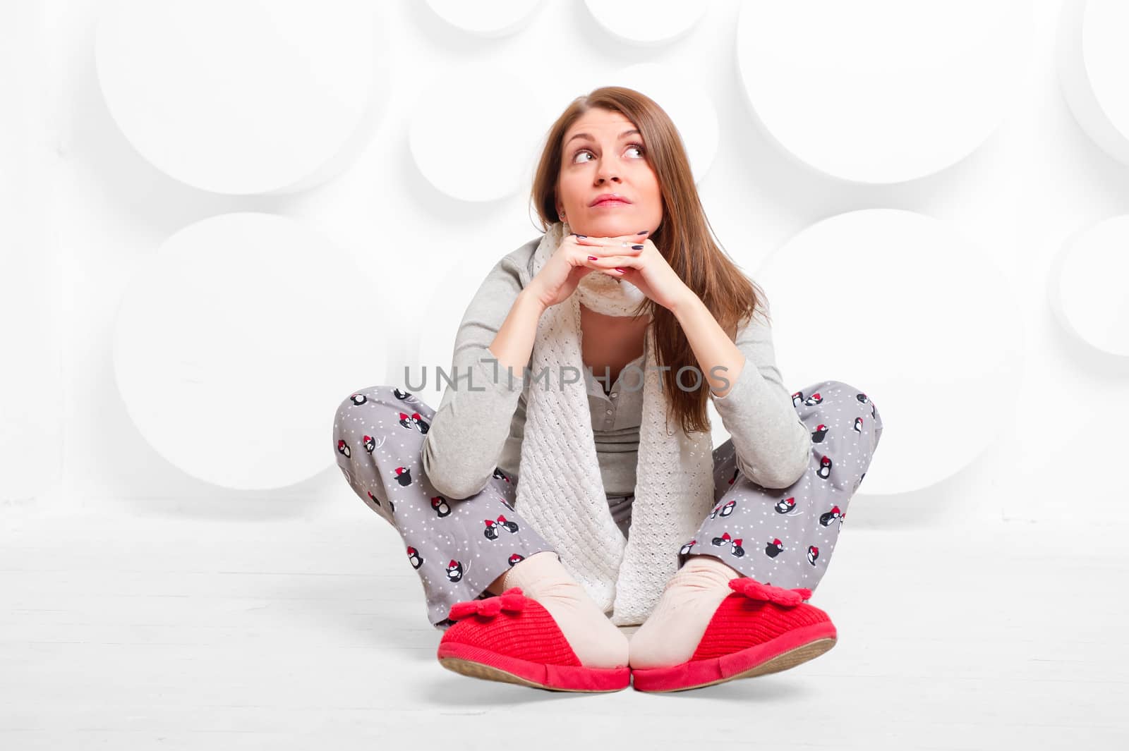 girl in studio in slippers and pajamas