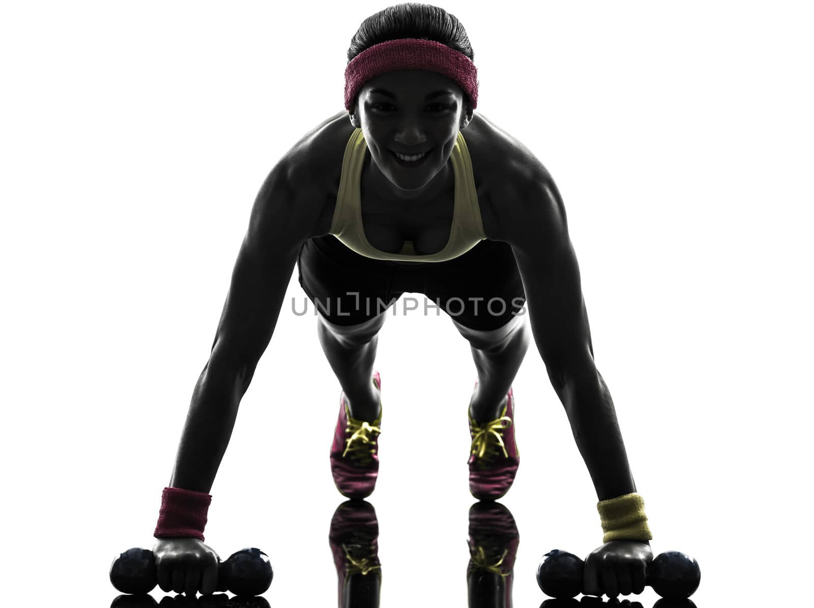 one woman exercising fitness workout push ups in silhouette on white background
