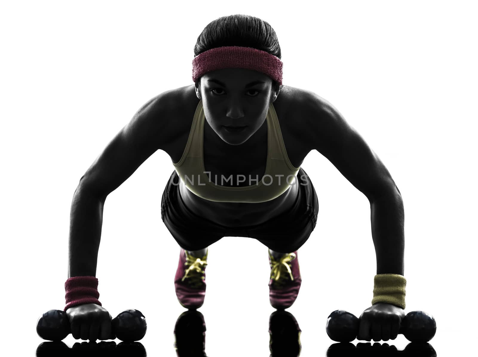 one woman exercising fitness workout push ups in silhouette on white background