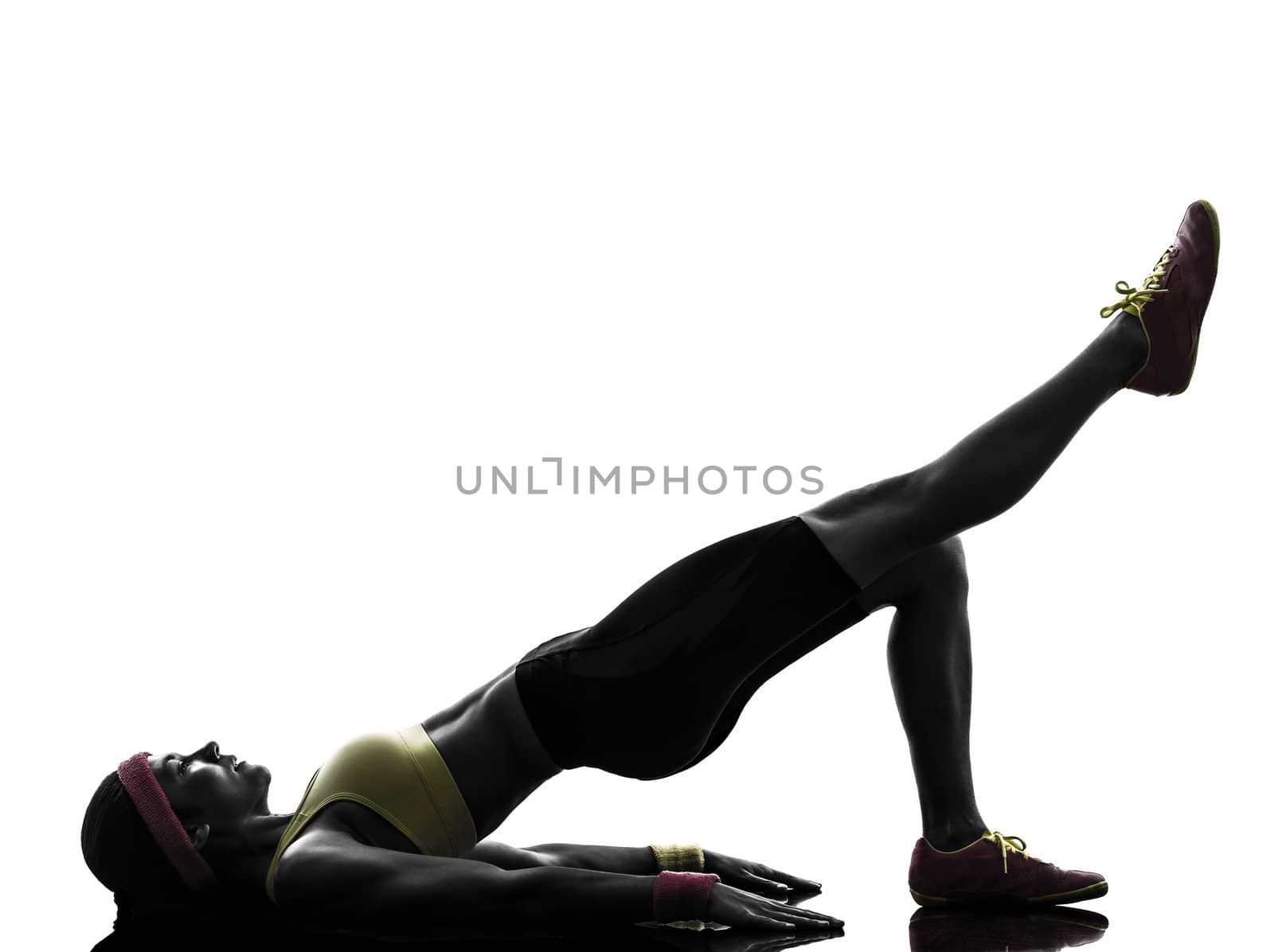 one woman exercising fitness workout in silhouette on white background