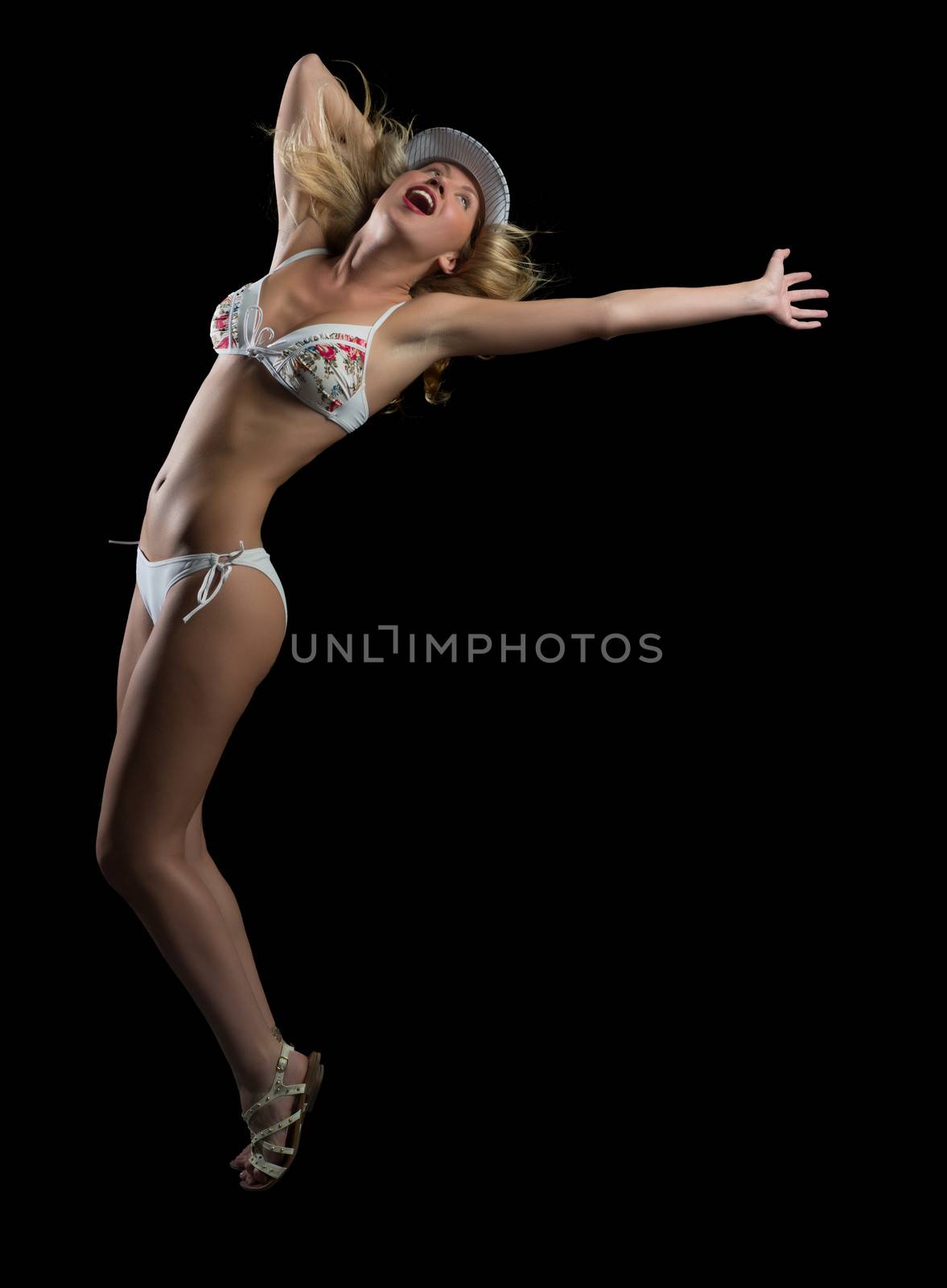 woman in bikini and hat dancing by adam121